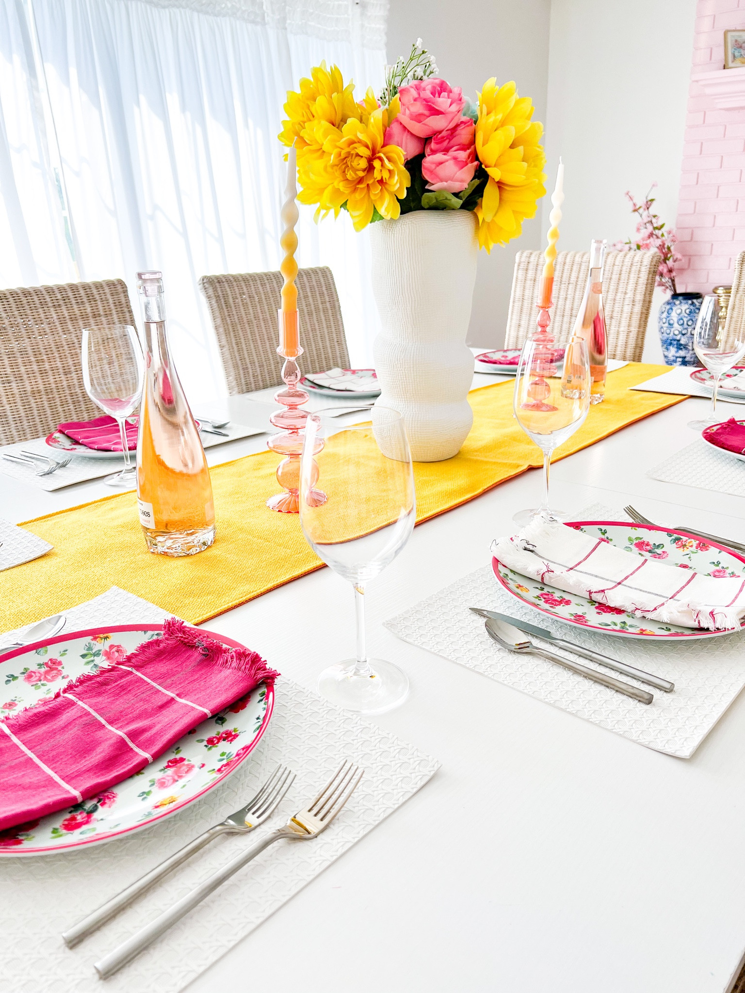 Beautiful spring tablescape! Yellow and pink tablescape! Colorful dining room table! #LTKhome #LTKdining #LTKdecor 