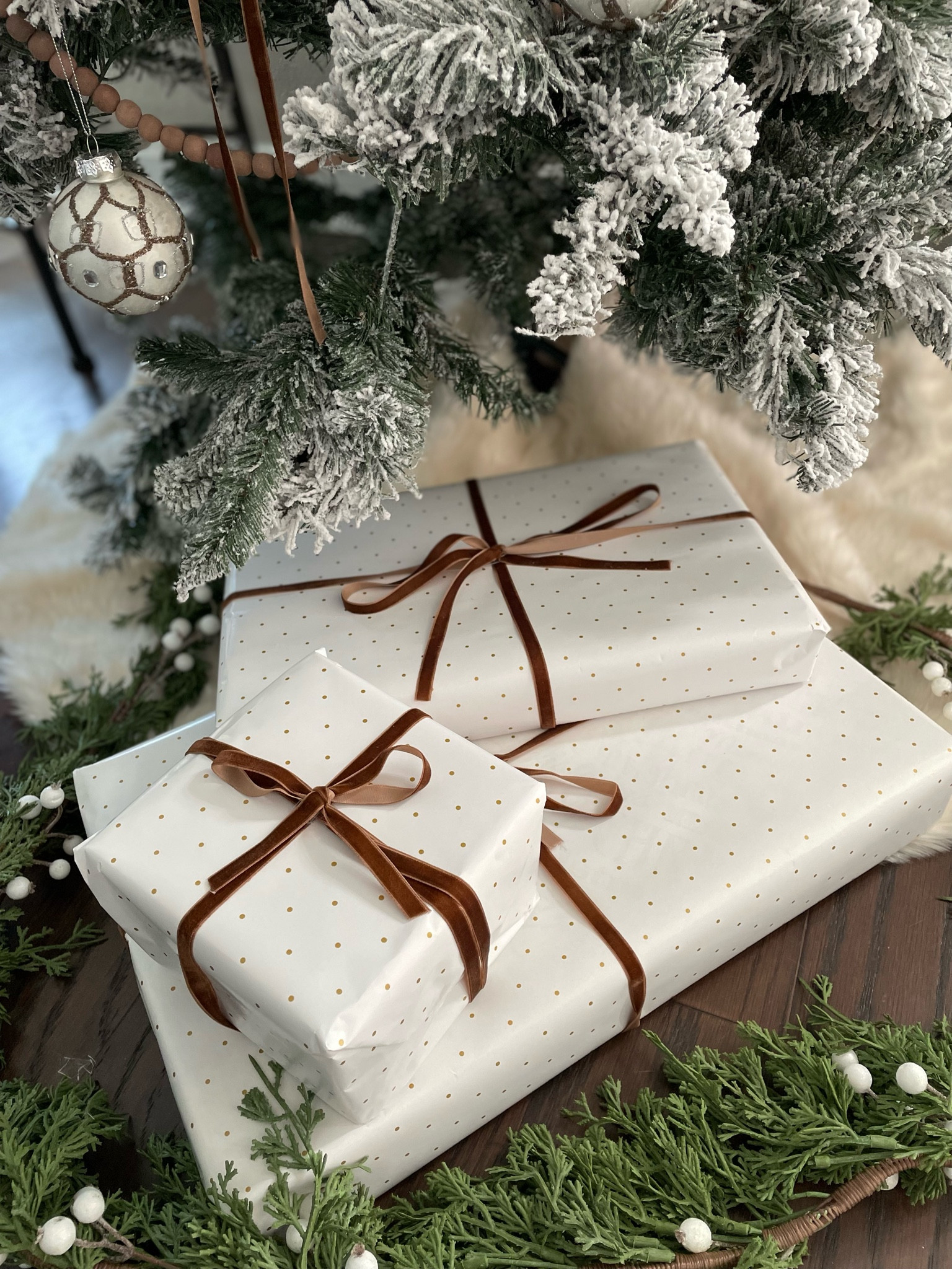 $15 set of 4 gold and white wrapping paper at Walmart // velvet ribbon // Christmas wrapping paper // gift wrap // neutral gift wrap 

#LTKSeasonal #LTKHoliday #LTKFind