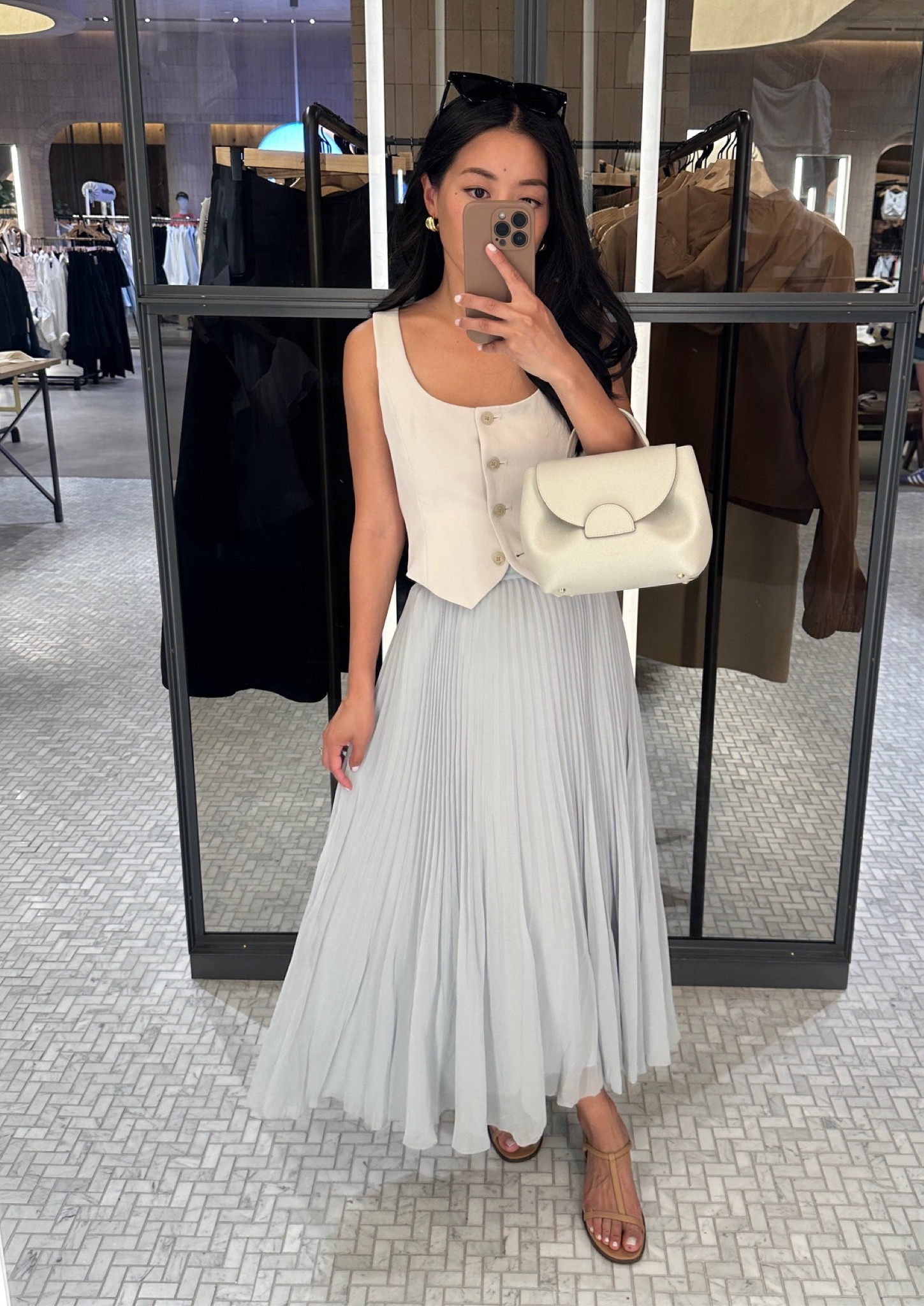 Rare Aritzia sale! some petite friendly pieces worth checking out. The Martine cotton midi dress linked is also beautiful and fits me in Xs.

FYI - sale items are returned for store credit only 

• Twirl pleated skirt Xs - such an ethereal piece! the chiffon material is lightweight and floaty, and the wide elastic waist band is secure and comfortable. I sized up to Xs for comfort (Xs measures 12.25” across the waist)

• Rocco vest 0 - shrunken fit, runs small and narrow at the bust so I sized up. I recommend sizing up if you are above an A cup or between sizes to minimize pulling at the chest buttons. 

• Madewell sandals 5.5 love these 

• Polene bag (not linkable) 


#LTKworkwear #LTKsalealert #LTKSeasonal