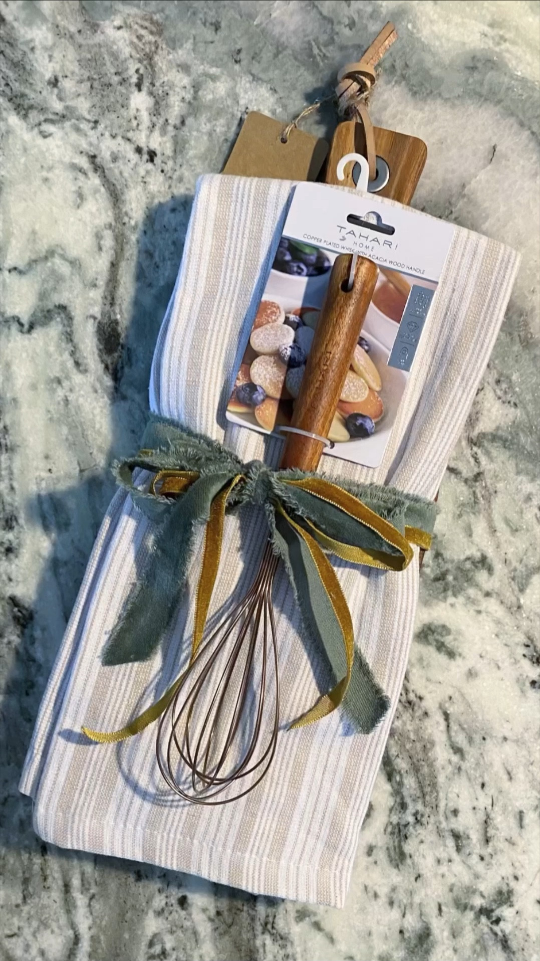 The perfect gift for a housewarming party or hostess gift! I can’t get enough of this gorgeous frayed edge velvet ribbon. Check out my splurge & save options!👇🏼

#LTKGiftGuide #LTKparties #LTKfamily