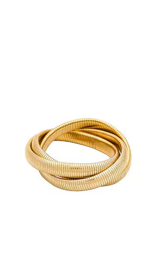 BRACHA She's Bossy Bracelet in Metallic Gold. | Revolve Clothing (Global)
