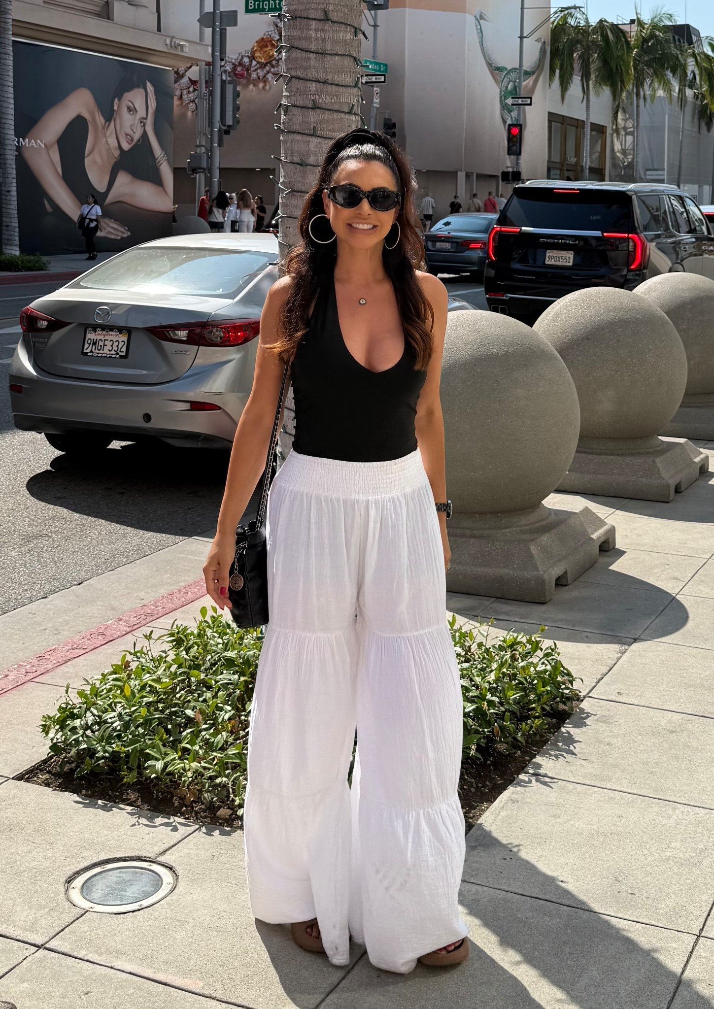 Shopping Chic on Rodeo! Super comfy for a hot day! And since the bodysuit is black, I’m wearing a black shape wear  shorts underneath the white pants so no lines show through. If you use nude shape wear, you will be able to see the black thong from the bodysuit. The pants are by Bobi from Revolve but they’re sold out - I linked  a similar 

#LTKSeasonal