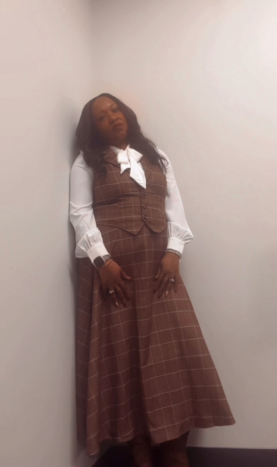 Classic plaid with a feminine twist 🤎🤍

This plaid two-piece set from SHEIN gives such a structured, flattering silhouette — the tailored vest defines the waist and the midi skirt flows beautifully.

I layered it with this bow-tie bodysuit for that polished, office-ready finish from Amazon. The snap closure keeps everything smooth and tucked, and the bow detail adds the perfect soft, elegant touch.

Everything is linked here so you can recreate the full look ✨

#LTKWorkwear #LTKgrwm #LTKootd