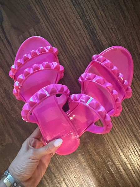 Bright pink jelly sandals 

#LTKSaleAlert #LTKFindsUnder100