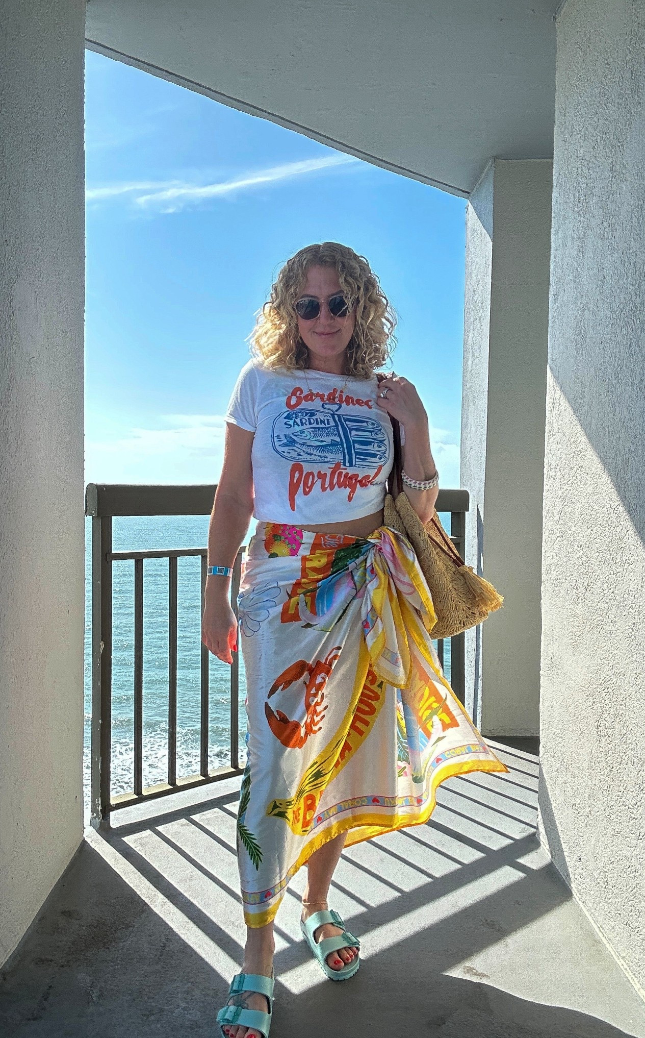 Beach vacation outfit 🌊 Graphic coastal tee styled with a colorful sarong wrap skirt and comfy platform sandals. Perfect easy resort wear look for spring break, beach trips, and summer vacations.
.
.
beach vacation outfit women, resort wear outfit women, sarong wrap skirt outfit, beach cover up skirt outfit, graphic tee outfit women, colorful vacation outfit, casual beach outfit women, platform sandals outfit women, spring break outfit women, summer beach outfit women
.
#resortwear #beachvacationoutfit #sarongstyle #vacationstyle #ltkstyle

#LTKTravel #LTKSwim #LTKootd
