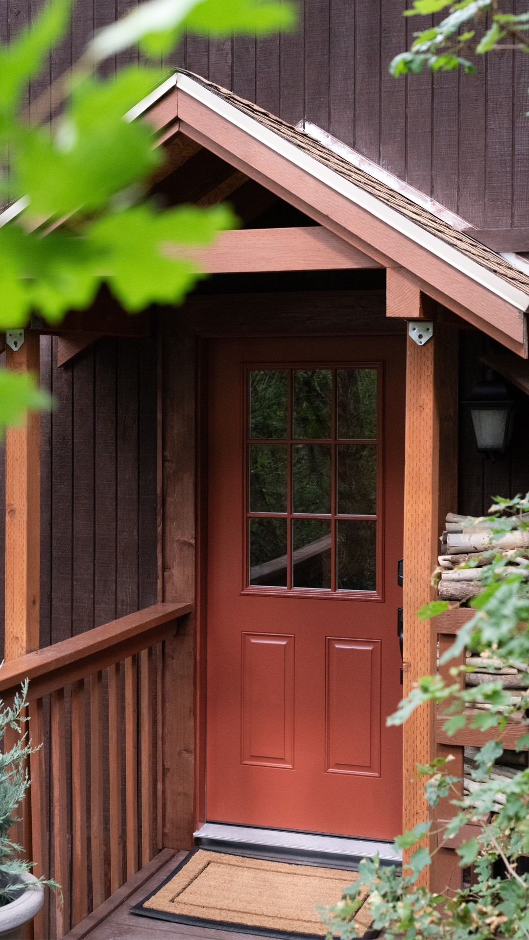 #ad  A budget friendly before & after, thanks to @lowes ! We replaced the cabin front door, exterior sconce, doormat, and I added a classic planter. #LowesPartner #Lowe’s

#LTKHome