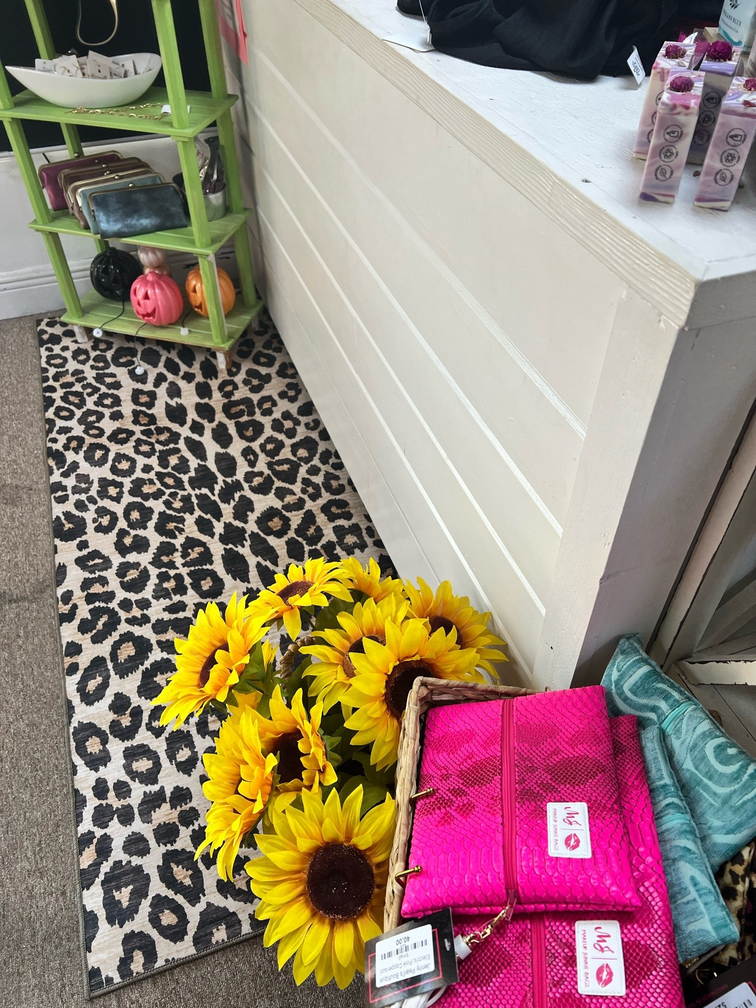 Found the cutest little leopard rug at Walmart for in front of my boutique counter 🐆🖤 Such a good little accent rug!