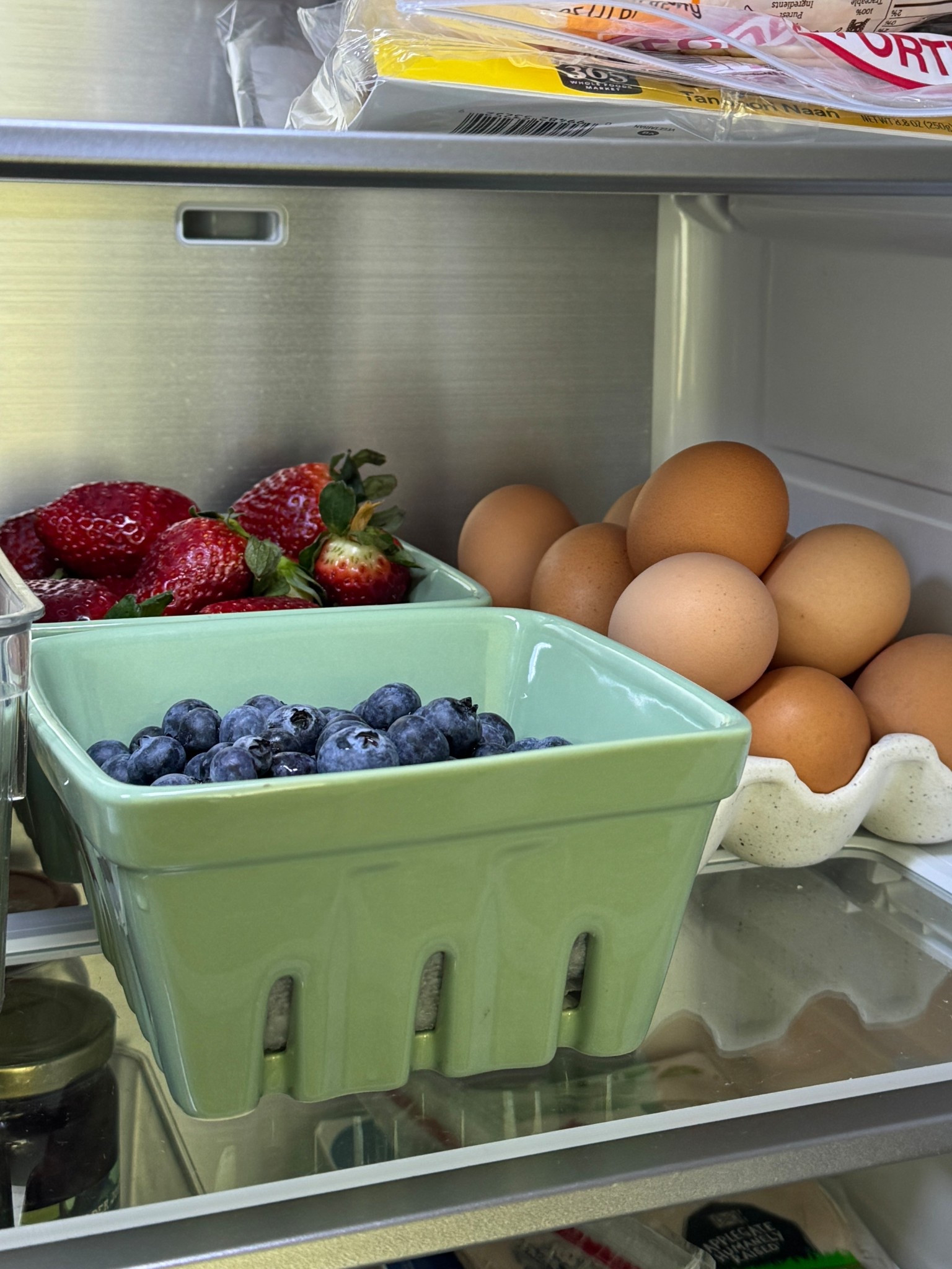 my favorite glass bins to store fruit in. They come in all different colors 
