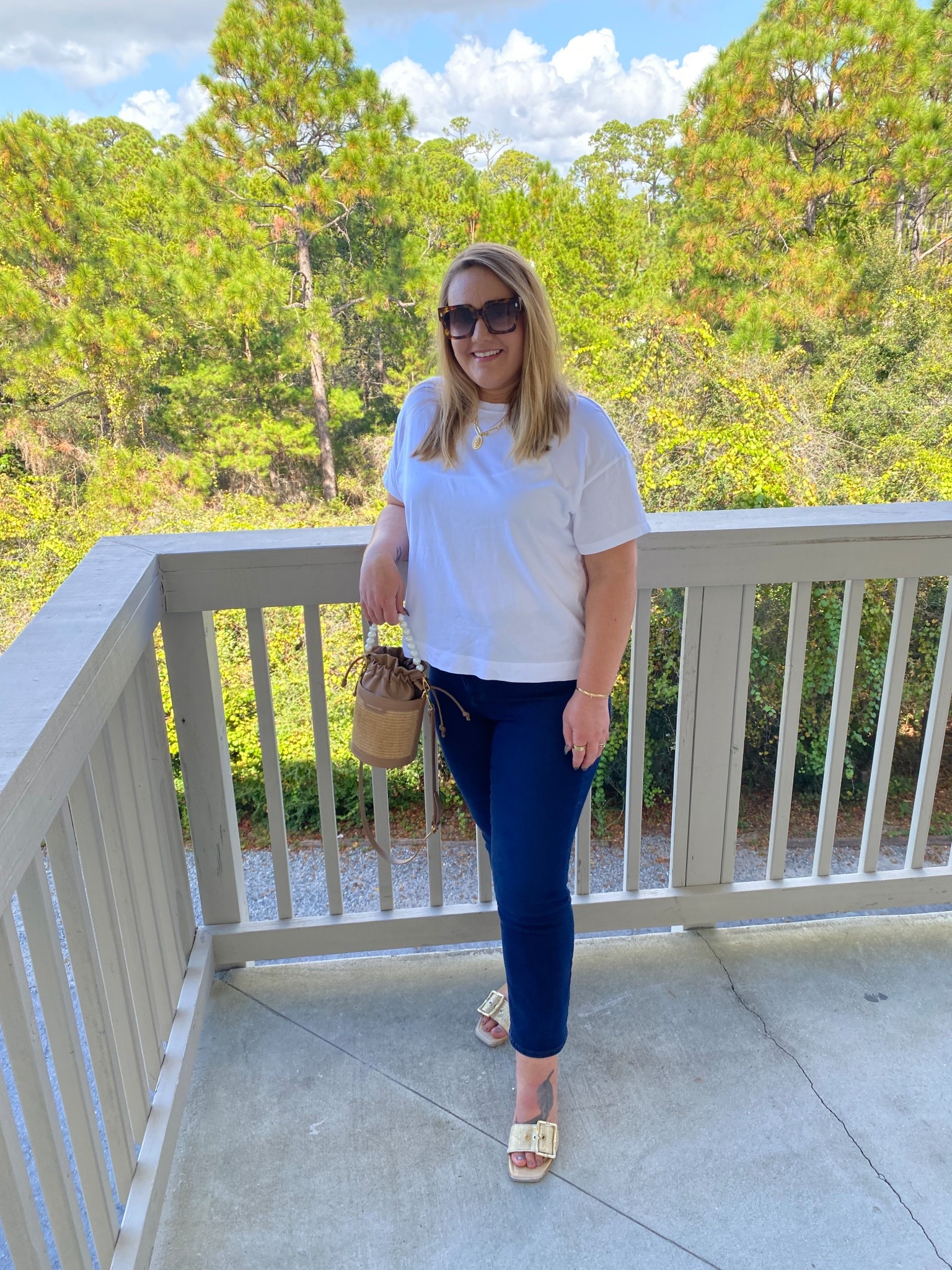 Classic white tee and jeans, white and navy, beach casual, beach vacation, jeans and tee, white t-shirt, vintage tee, gold sandals, slide sandals, dsw sandals, dolce vitamins sandals, gold buckle sandals

#LTKFindsUnder50 #LTKTravel #LTKMidsize