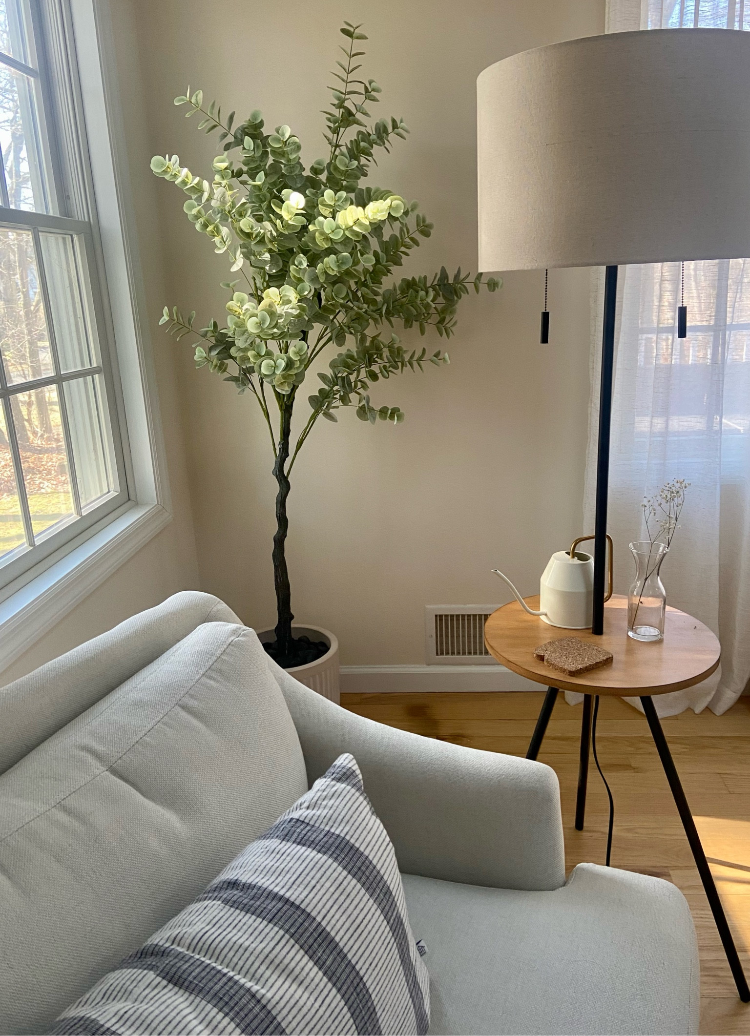 Prettiest faux eucalyptus plant and planter to refresh your space for spring! Lamp accent table is perfect to light up clean interior corners. #ltkfind

#LTKSeasonal #LTKstyletip #LTKhome