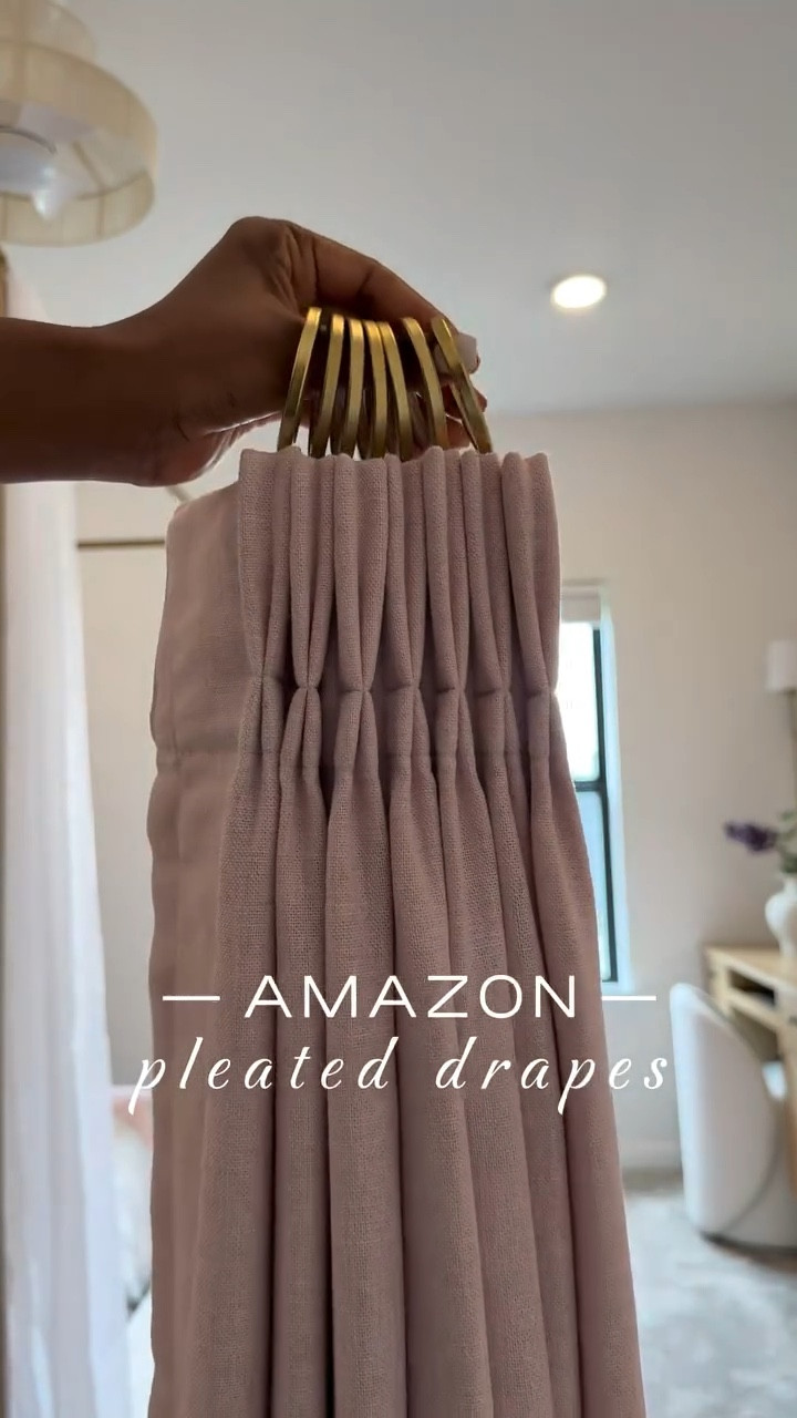 I'm absolutely in love with how  my daughter Michelle's room drapes turned out 👌🏾…..I've also got the same drapes in our guest room and great room.

Like many of you, I received a hefty quote for drapes a few years ago - 10K to be exact…..and that was just for three windows. 😅 I mean, who doesn't love the look of custom drapes? I particularly love the pinch pleat - it's my favorite. 😍 

One thing to keep in mind with this system is that you'll need to account for roughly 6 inches of slack. 🤎 So if your ceiling height is 108 inches, you'll need to order 102-inch drapes if you want to hang the rod at the very top and have the drapes ""kiss"" the floor. Thanks to hubby for helping me figure out precision & measurements. Shop now and  transform your home.

#LTKSaleAlert #LTKStyleTip #LTKHome