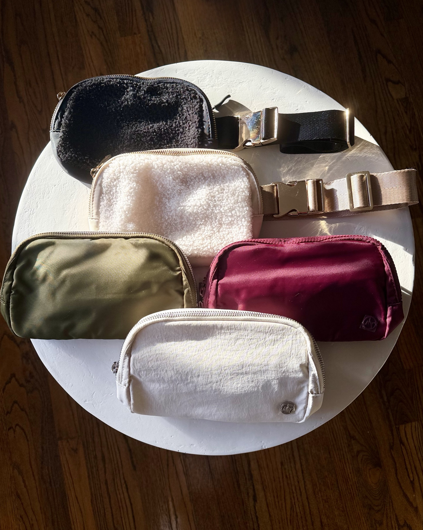 L*lule*on ‘Everywhere’ Belt Bag look for less 🤩

I get SO much use out of these all year round! Good quality & spacious interior to fit my phone, credit cards, lipsticks, car keys etc. 

I’m 5’4”, 120 lbs & I’m able to wear them both as a crossbody & as a fanny pack!  I wear it as a crossbody when I’m running errands, at a football game, & even day trips when travelling around Europe!  I rock the fanny pack when i’m working out outside or walking my dog (they’re great for holding doggy 💩 bags!)

The Boucle/Sherpa material ones are my go-to bags during these cold winter months! You’ll love them!  🐑  

#LTKFindsUnder50 #LTKActive #LTKTravel