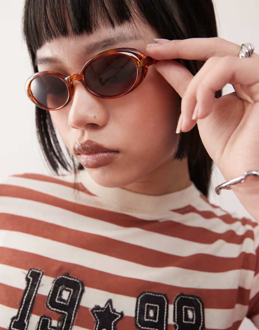Reclaimed Vintage oval sunglasses in orange tortoiseshell | ASOS (Global)