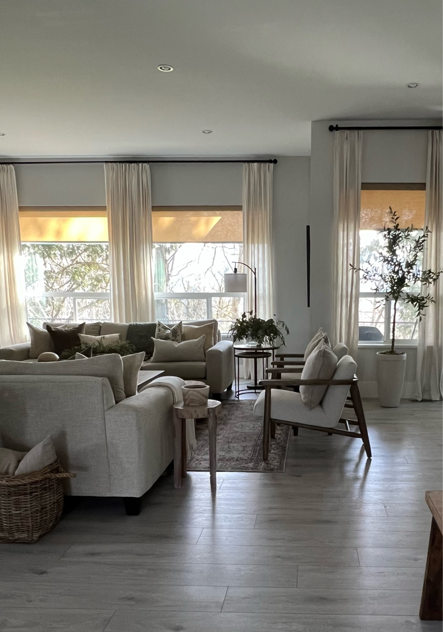 Window treatments! 
I have motorized shades in beige fabric from Graywind . Curtains are from Twopages, the Liz linen pinch pleat in ivory white. 

#LTKhome #LTKSeasonal #LTKfamily