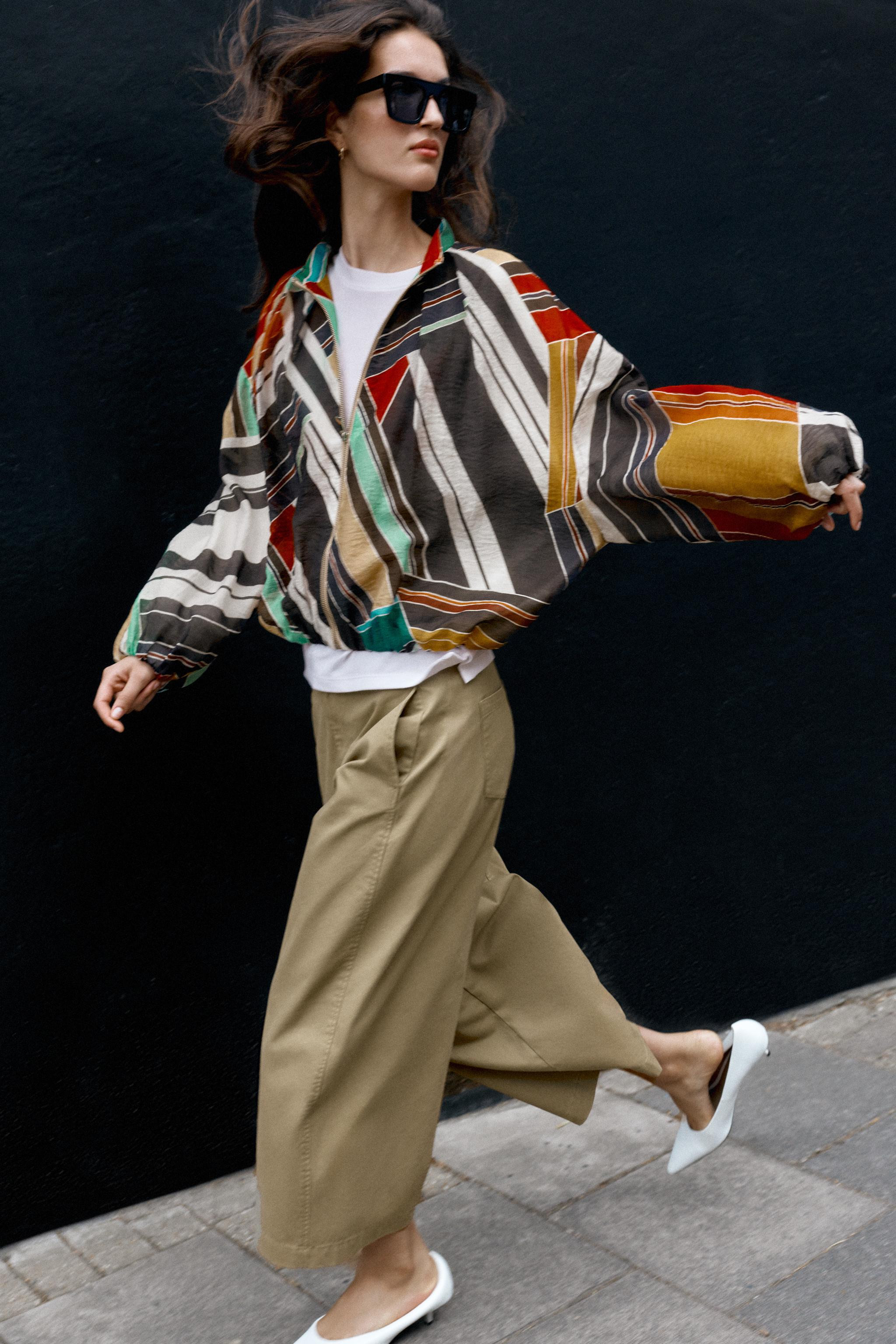 Bomber jacket featuring a stand-up collar and long puffed sleeves. Hidden side seam pockets. Elas... | Zara US