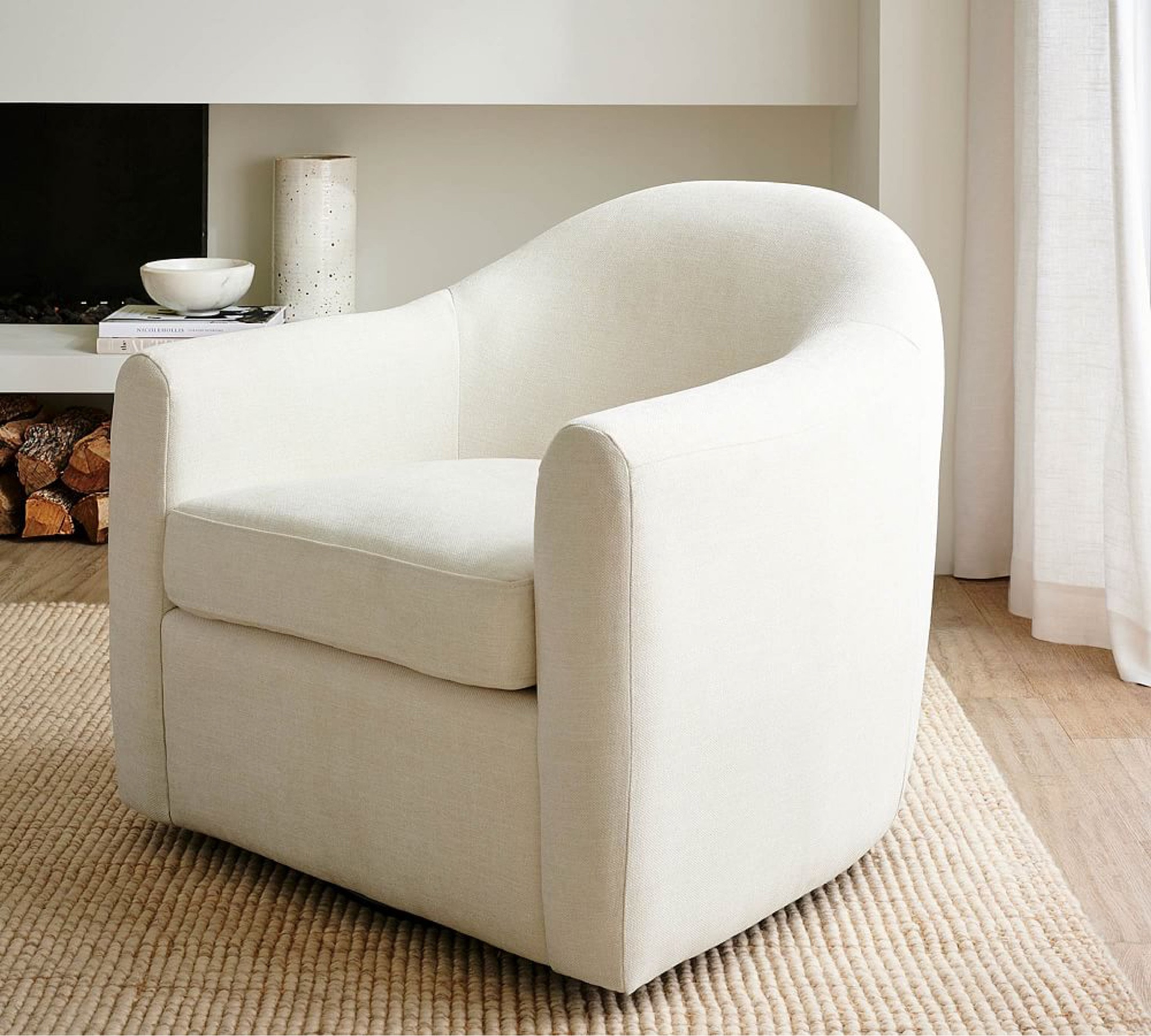Cozy swivel chair perfection. Loving the curved back details 🪑

#LTKStyleTip #LTKHome #LTKSeasonal