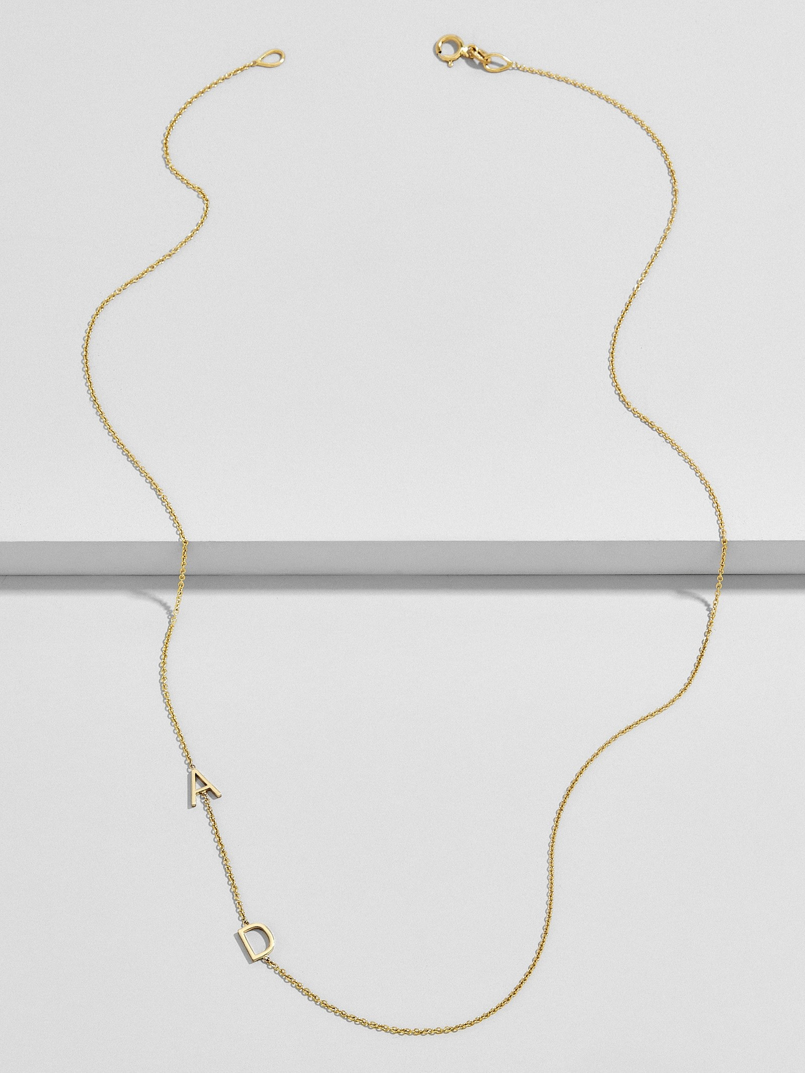 Maya Brenner Asymmetrical Character Necklace | BaubleBar (US)