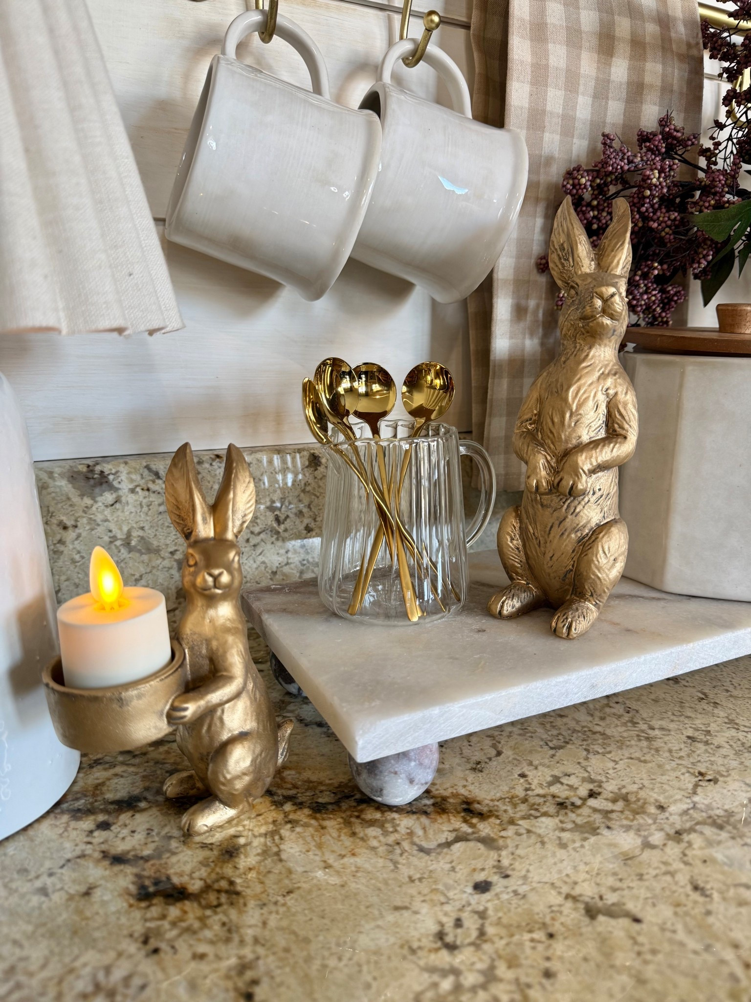 Under $20 Amazon Spring Decor Find You Need 🐰

Follow @farmtotablecreations on Instagram for more neutral home inspiration 🤍

These charming gold bunny accents are such an easy way to bring a soft spring touch into your home without going over the top. The warm metallic finish adds just the right amount of shine while still blending beautifully with neutral decor. Style them on a kitchen counter, coffee bar, tray, or shelf for an instant seasonal refresh that feels elevated — and the best part is both pieces are under $20.

#amazonfinds #amazonhome #springdecor #easterdecor #bunnydecor #kitchendecor #countertopdecor #traydecor #golddecor #neutraldecor #coffeebar #counterdecor 

#LTKSeasonal #LTKHome #LTKSaleAlert