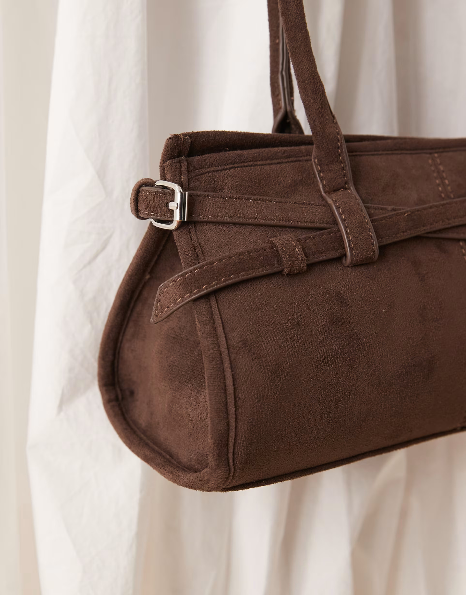 Gina Tricot faux suede buckle bowling shoulder bag with long handles in dark brown | ASOS | ASOS (Global)