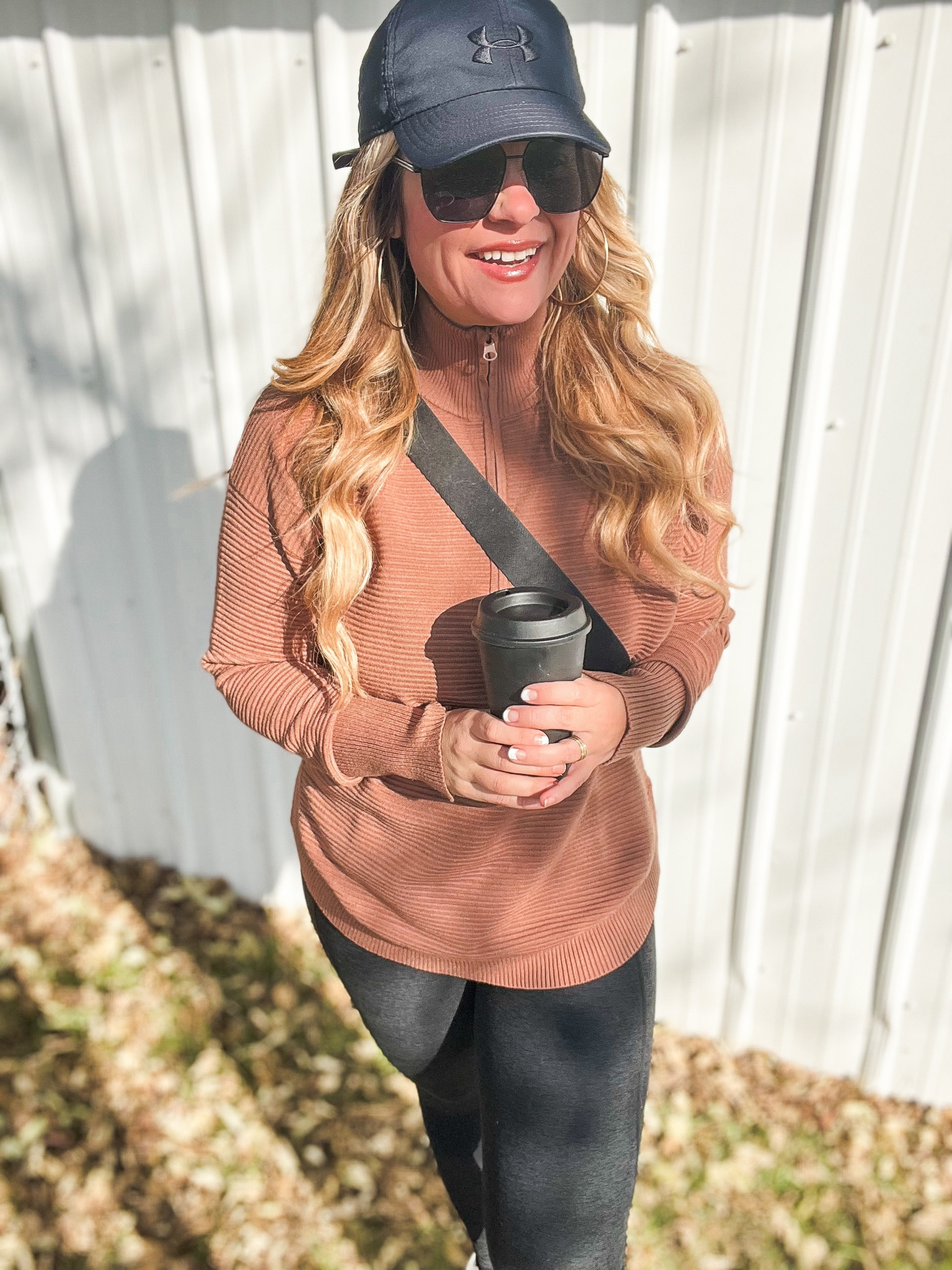 Amazon Viral Zip Up! Grab in brown white and black! Looks so good with vests for game days. 
Black coach crossbody 
Black
Hat!

The beyond yoga leggings are soooo soft and comfortable I had to get them this season. If your into soft clothing you need these leggings. I’m wearing a large for added comfort. My top is a Medium. Fall outfit ideas
Winter outfits
Black matte sunglasses 

#LTKfindsunder100 #LTKSeasonal #LTKfindsunder50
