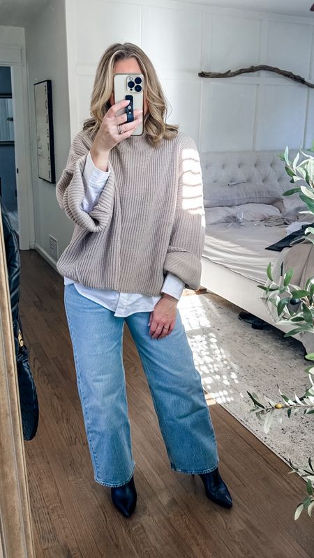 I love layering this oversized sweater with a button down and jeans. It’s classy, timeless yet feels trendy. I’m in a medium but could’ve done a small. Small button down bc it’s oversized and true size 29 short jeans  

#LTKstyletip #LTKworkwear #LTKMostLoved