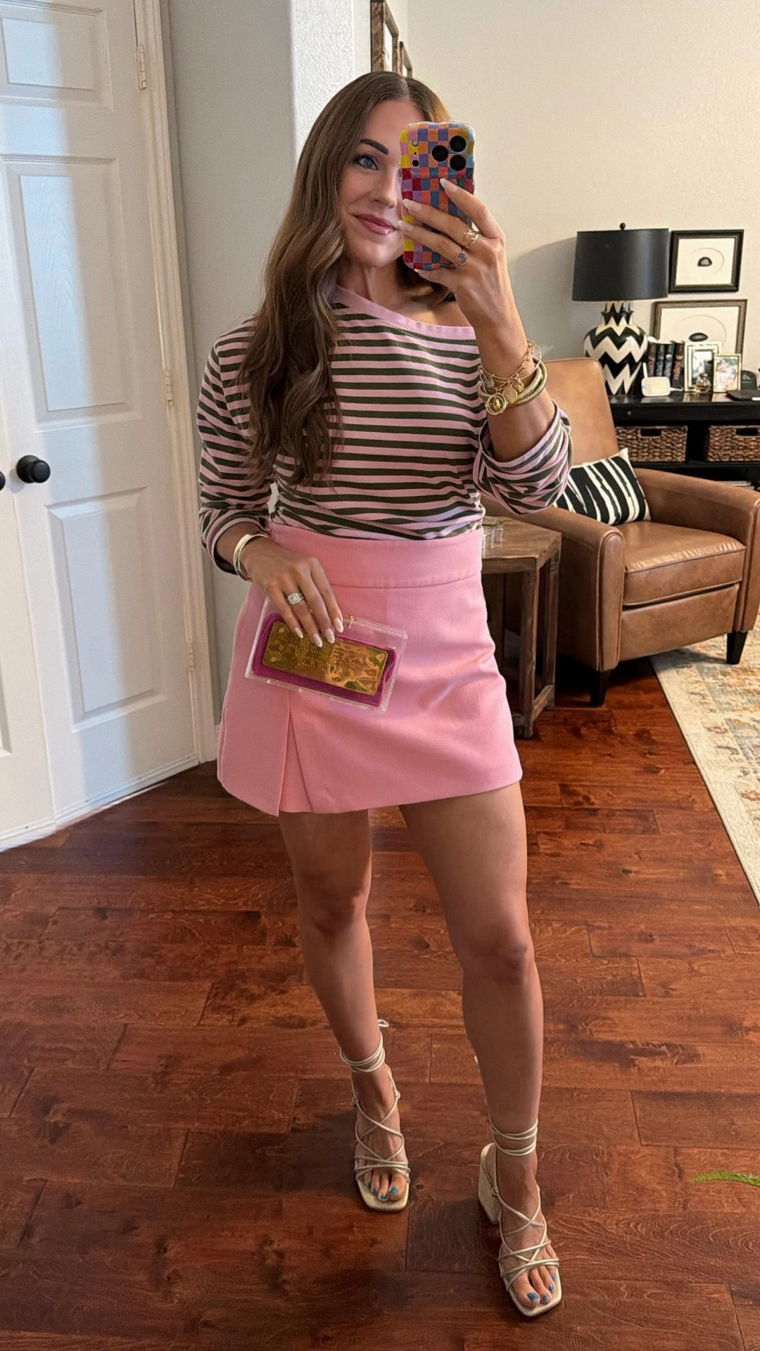 Girls dinner date night outfit inspo spring fashion 2026 asos striped top pink Zara skirt Amazon heels

Skort is old from Zara
Earrings are from plain and fanci boutique - cardi earring

#LTKOver40 #LTKFestival #LTKootd