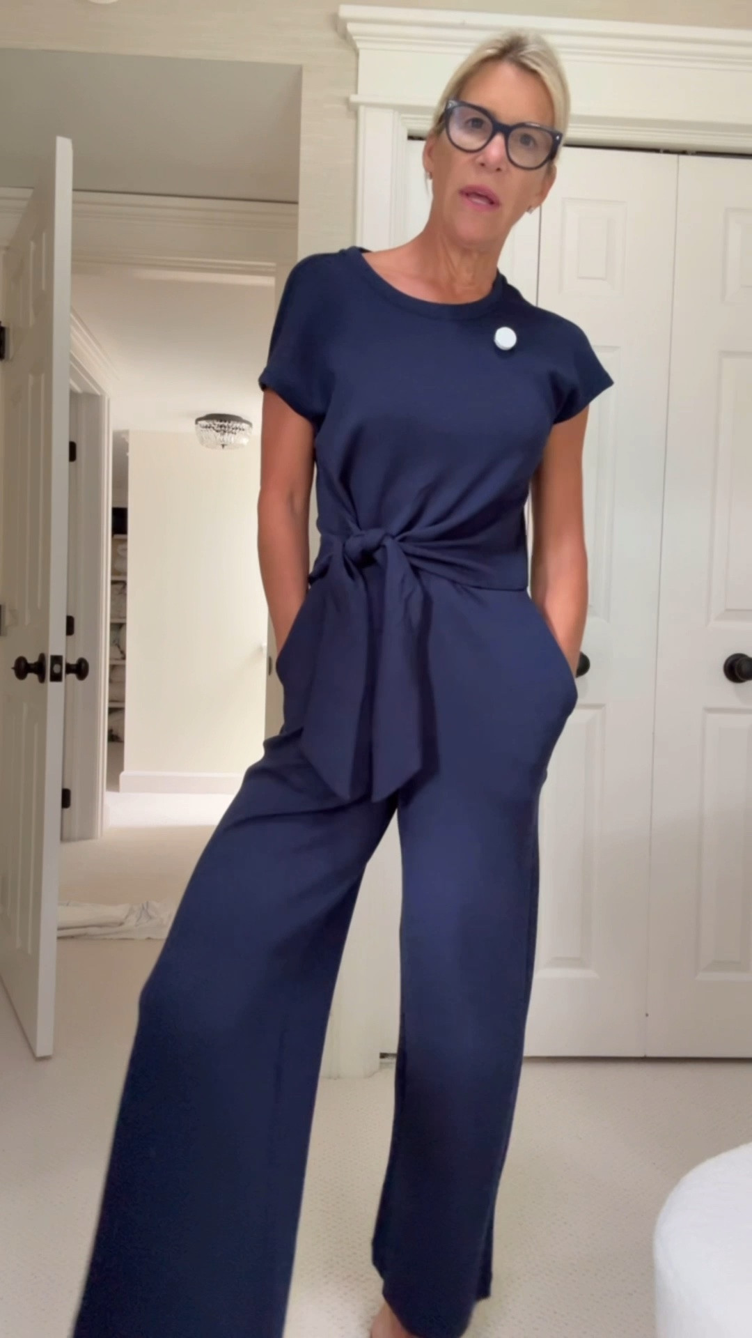The perfect daytime jumpsuit that is comfy, cute, casual and current!  With a navy cable sweater that’s 40 bucks!

#LTKCon #LTKOver40 #LTKootd