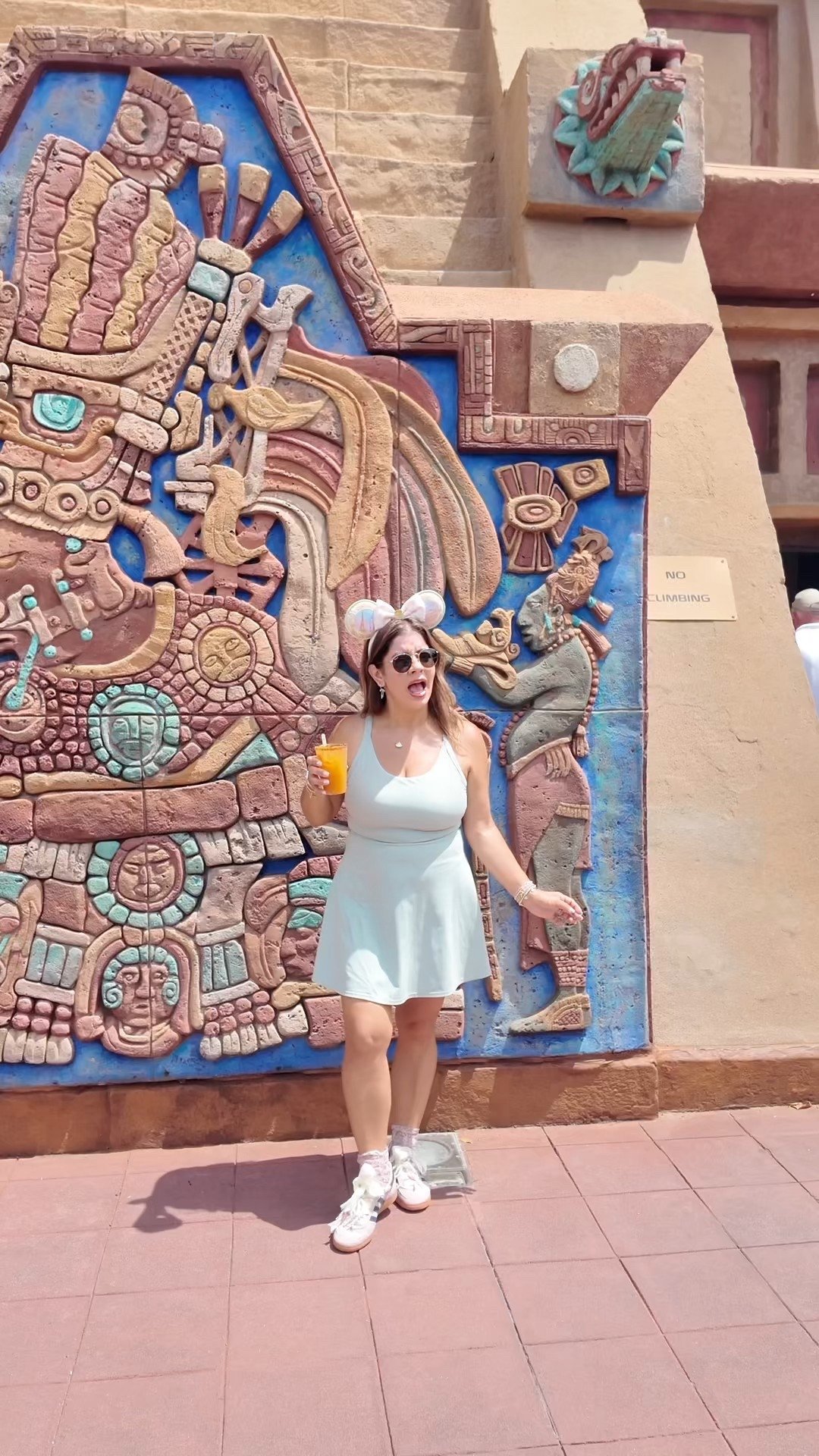 Disney OOTD for Epcot’s Food and Wine Festival. #newdisneyears #halaradress #pouchettepurse #disneyoutfit