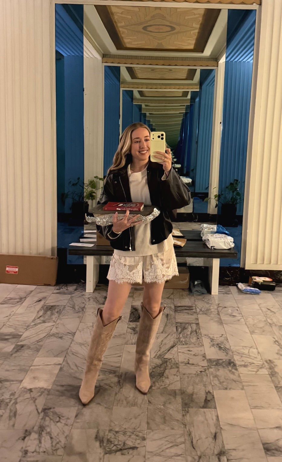 Fall outfit with cowboy boots and satin shorts ✨

Fall | brown leather jacket | satin shorts | neutrals 