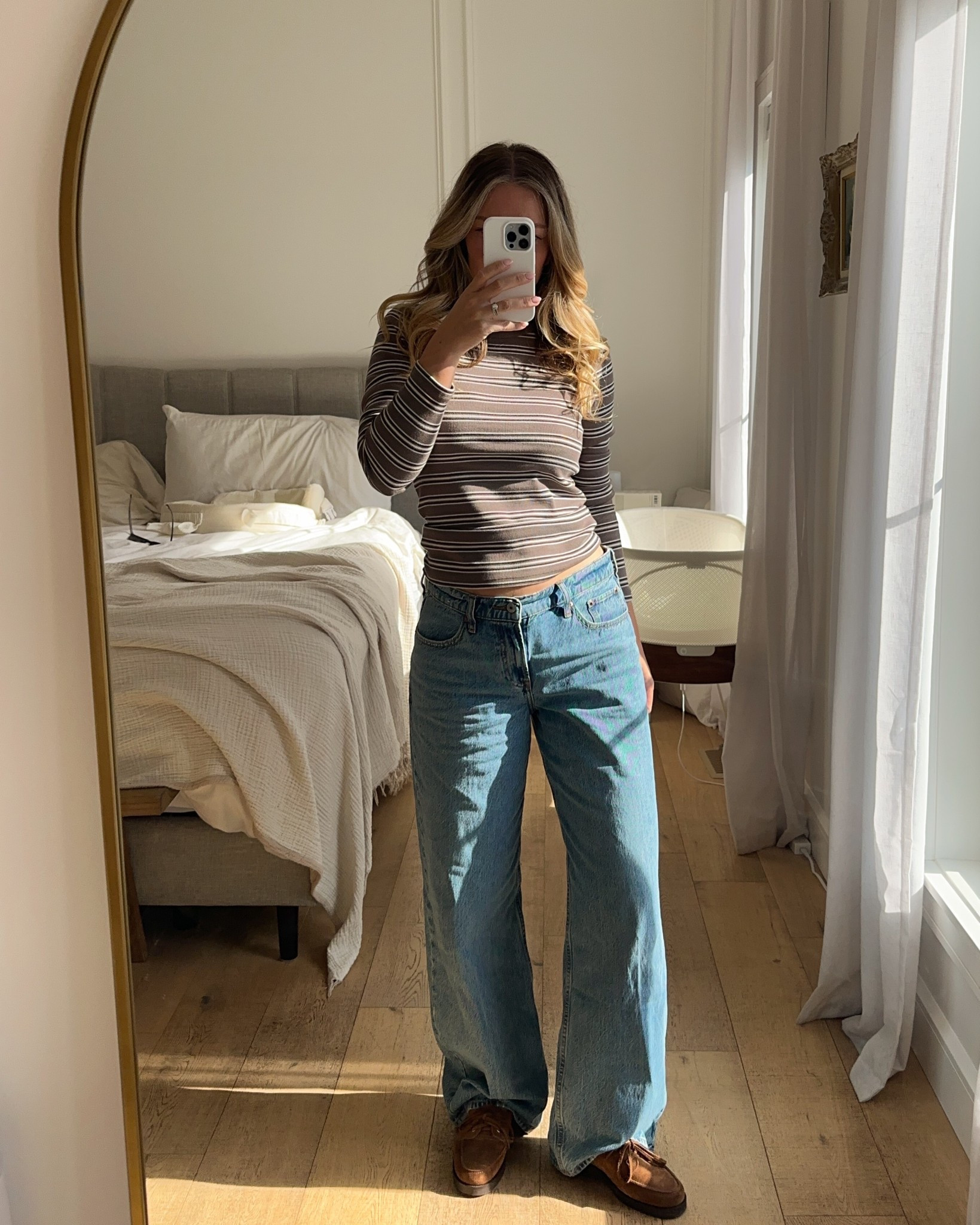 stripes + loafers for fall!! 🍂 wearing size small in shirt, size 28 in jeans for perfect oversized fit, size 7 in loafers (run 1/2 size small)

#LTKcanada #LTKjeans #LTKstyletip