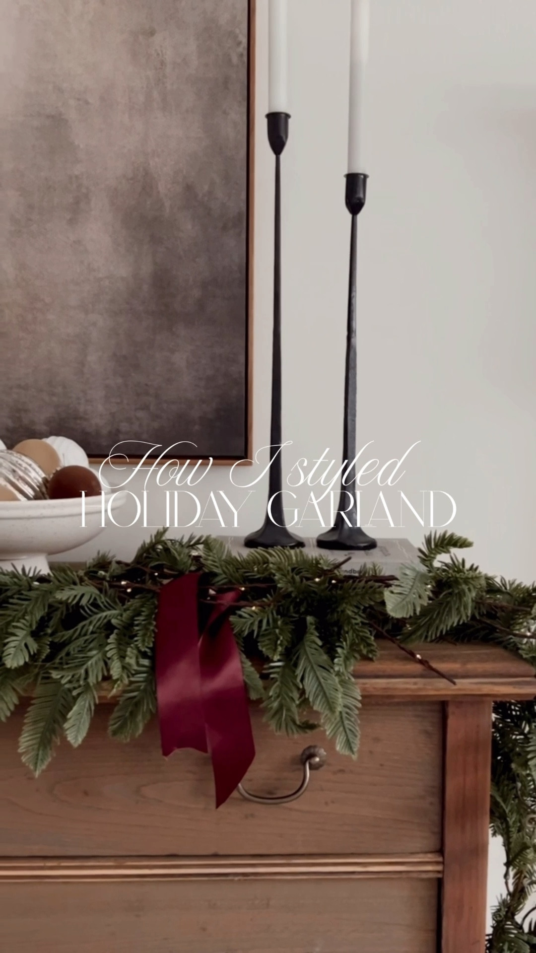 Classic and simple holiday styling with my favorite green garland from Amazon! Paired with twinkly lights, candles and a bow filled with ornaments 

#LTKHoliday #LTKSeasonal #LTKHome