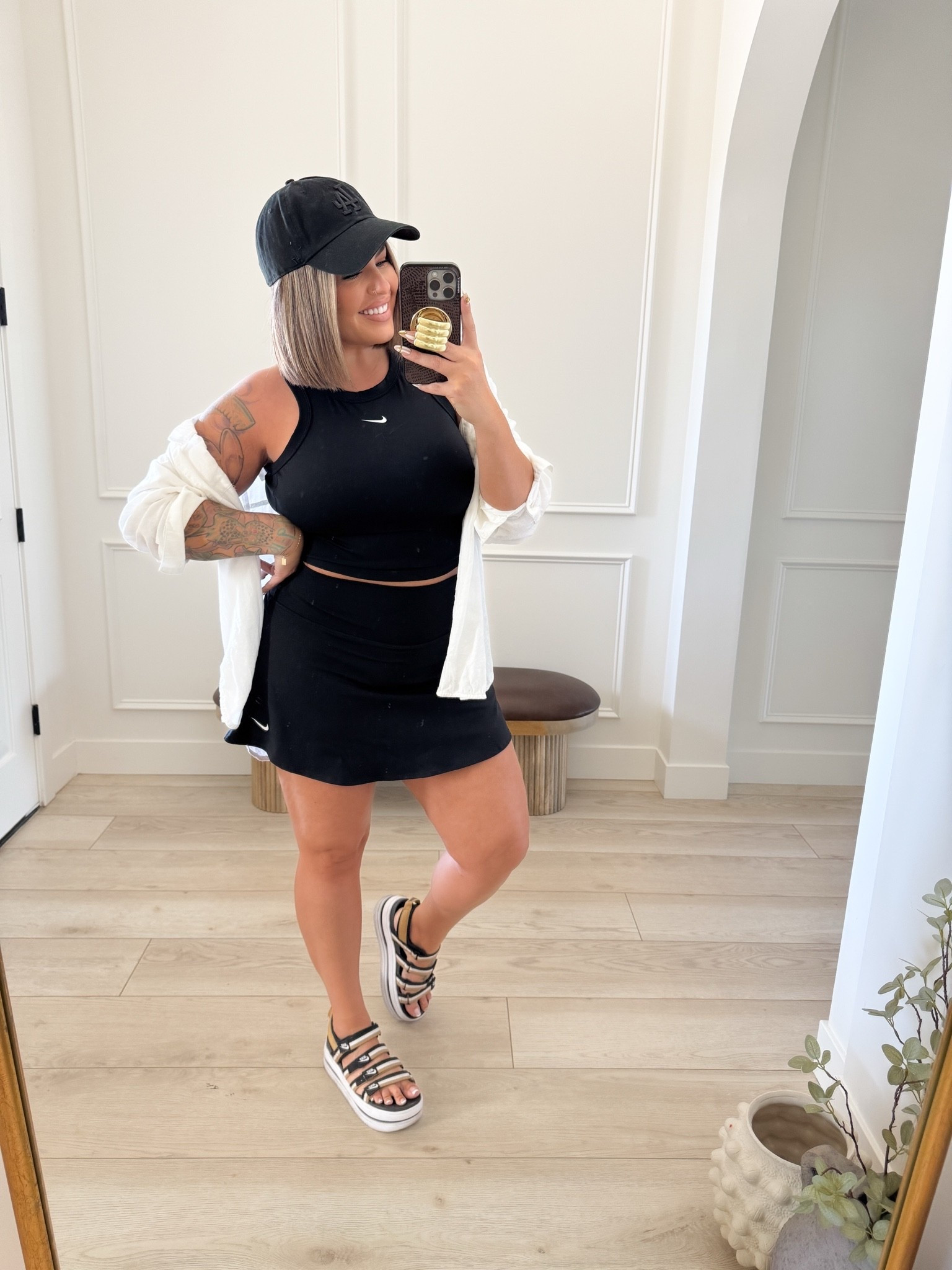 Sandals are an older color that’s sold out but linked the same style in black they are extreamly comfy ! 
Top L 
Skirt L has shorts built in 
White top xl tall