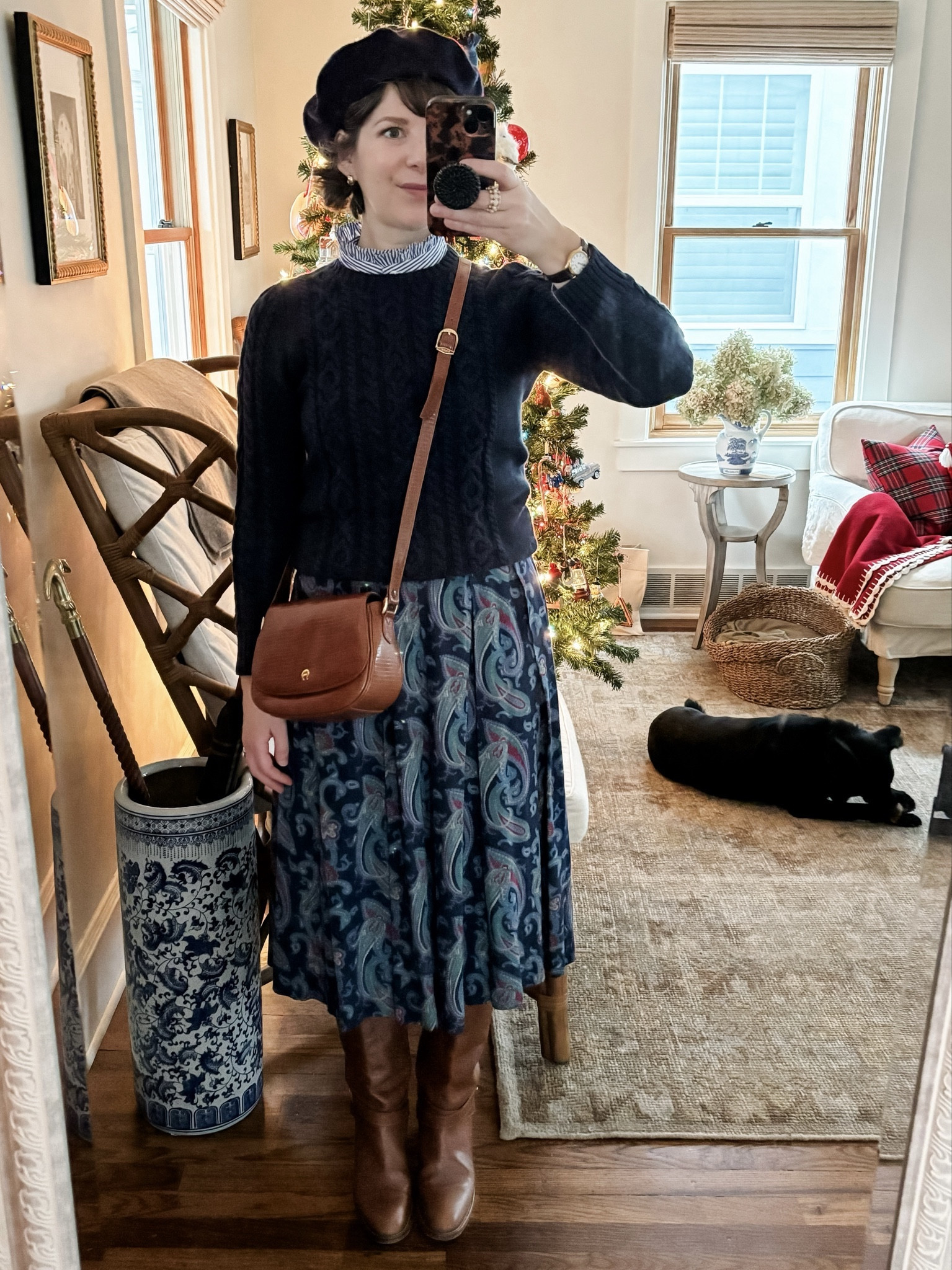 OOTD // December 3, 2023 - a repeat outfit formula: midi skirt, riding boots, and cable knit sweater. 

#LTKworkwear #LTKstyletip #LTKmidsize