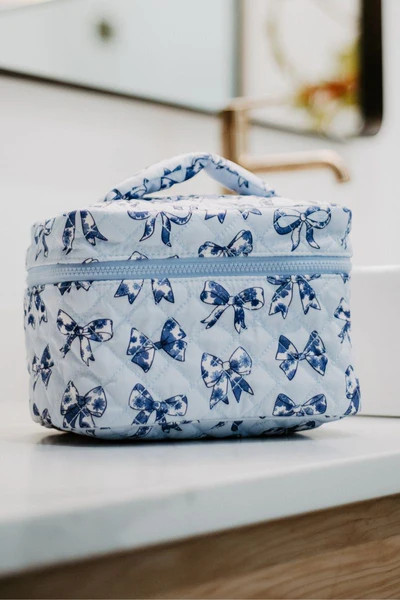 Light Blue Toile Bows Cosmetic Travel Bag | Katydid