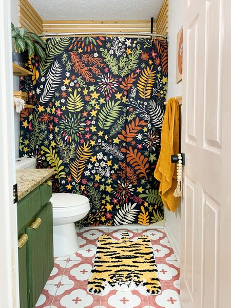 Small Colorful Eclectic bathroom, tiger rug, floral shower curtain, yellow towels 


#LTKstyletip #LTKunder50 #LTKhome