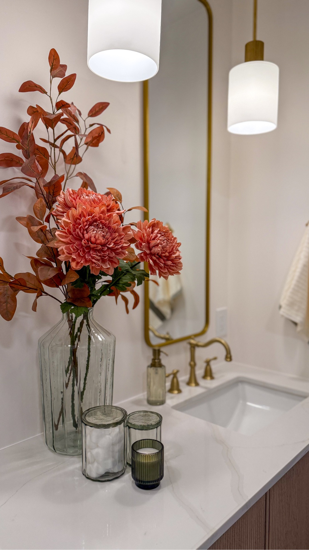 This vanity is even better in person. The fluted design and brushed gold hardware add just the right amount of depth and warmth, setting the tone for this charming and inviting guest bathroom.

#LTKHome