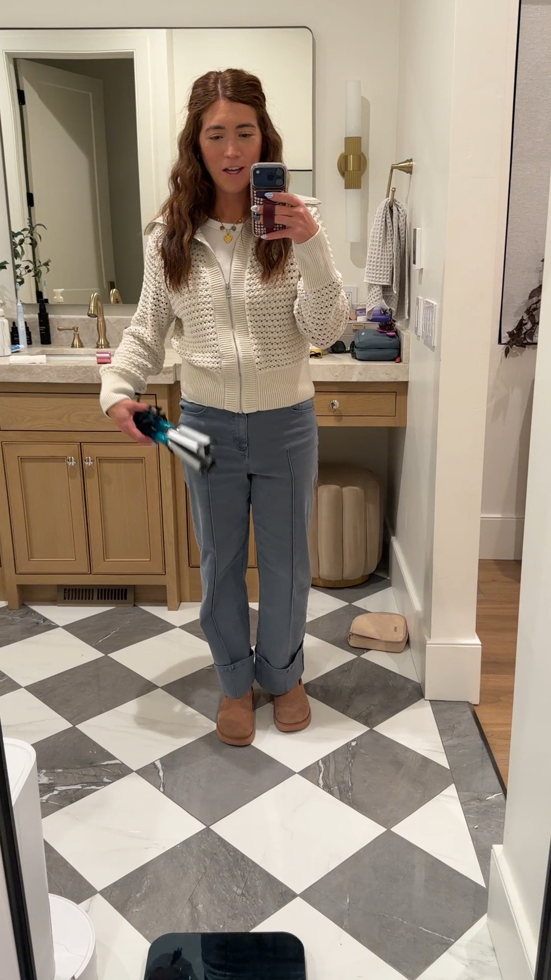 Small in sweater, 27 in jeans. They are not as cropped as the stock image shows. I’m 5’6” for reference  