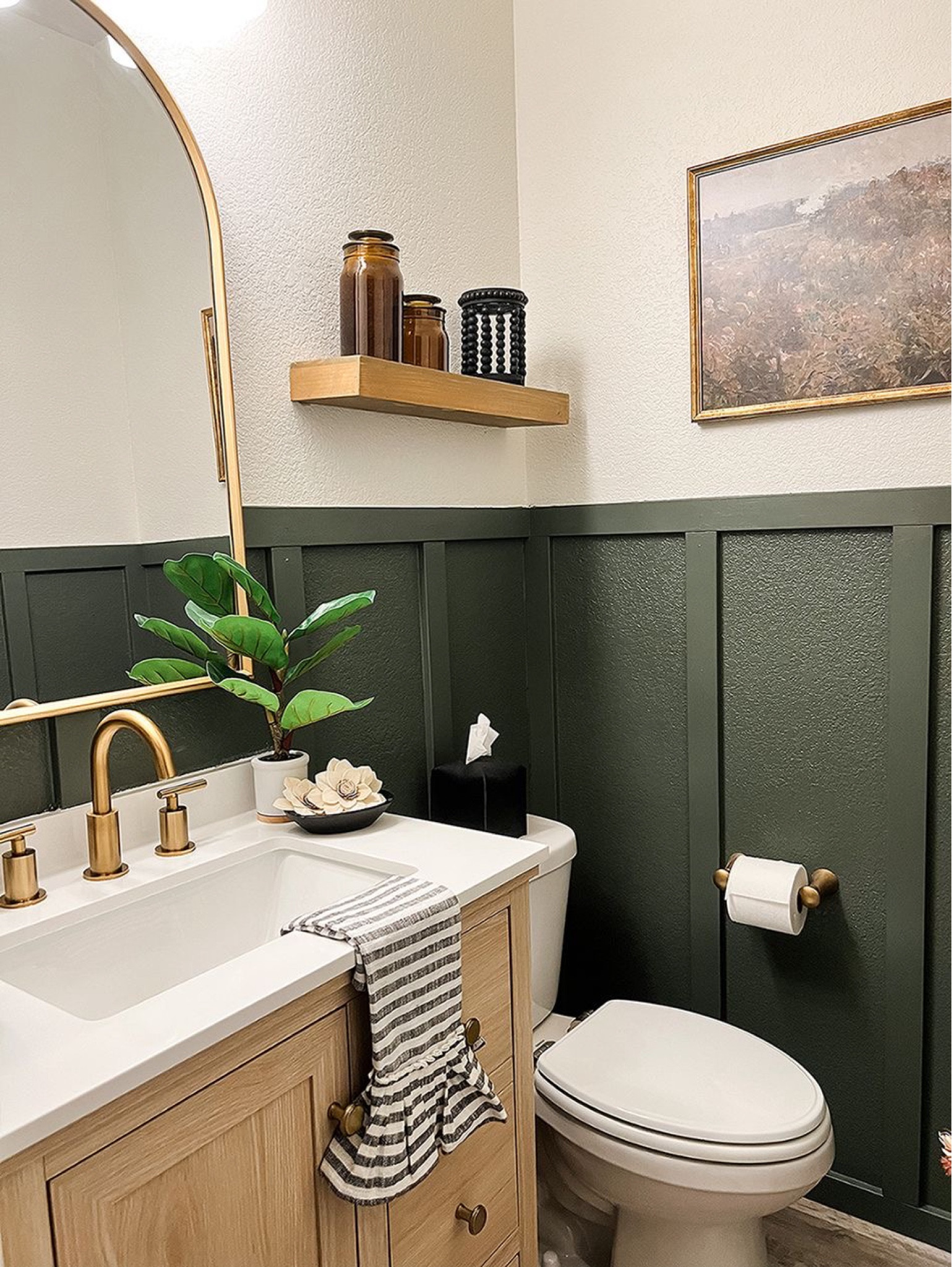 Can we admit that board and batten is making a come back? Like seriously!! This is a cheap and aesthetically please way to update any bathroom  

#LTKHome #LTKU #LTKWatchNow