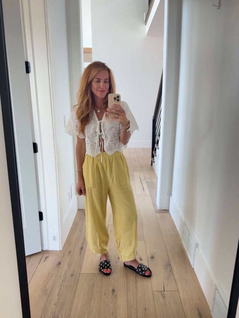 Finally found a look a like for the Anthropologie eyelet shirt that I love! This one has great details and has amazing details. I’m wearing the small.

Pants are from amazon and I have like 4 colors of them at this point. I LOVE THEM. So comfy, come in lots of colors and a great price point. I’m in the small.

Shoes are Beek! Love their sandals. Definitely on the pricey side, but I know that I’ll wear them for years and years. Use code TARA for 10% off!