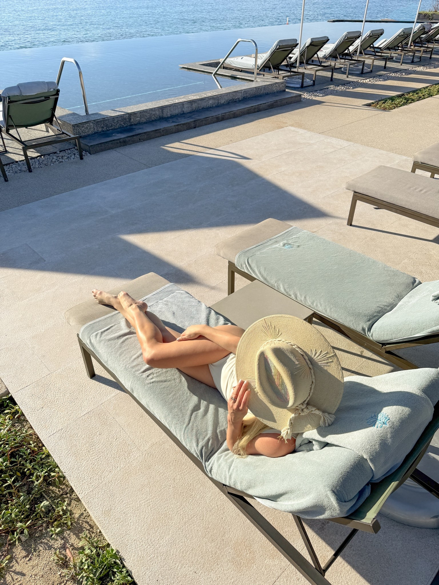 The kind of Cabo outfit you live in all day 🤍
A classic white one-piece paired with a flowy skirt cover-up & straw hat is the perfect balance of elevated and effortless. Ideal for pool days, beach walks, and resort afternoons that turn into sunset cocktails without a full outfit change.

Cabo beach outfit, white one piece swimsuit, swim cover up skirt, resort pool outfit, beach vacation style, tropical swimwear look, Cabo resort wear, straw hat beach outfit, poolside outfit, Mexico beach vacation

 

 

#LTKTravel #LTKWedding