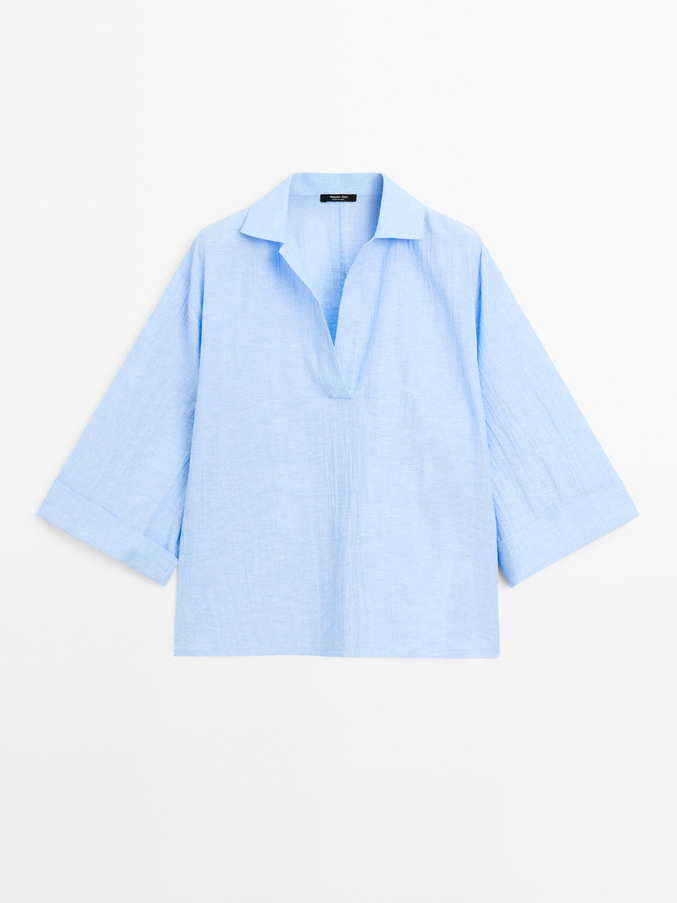 Flowing blouse made of textured fabric. Johnny collar. Short sleeves. Melange fabric. Wide and re... | Massimo Dutti UK