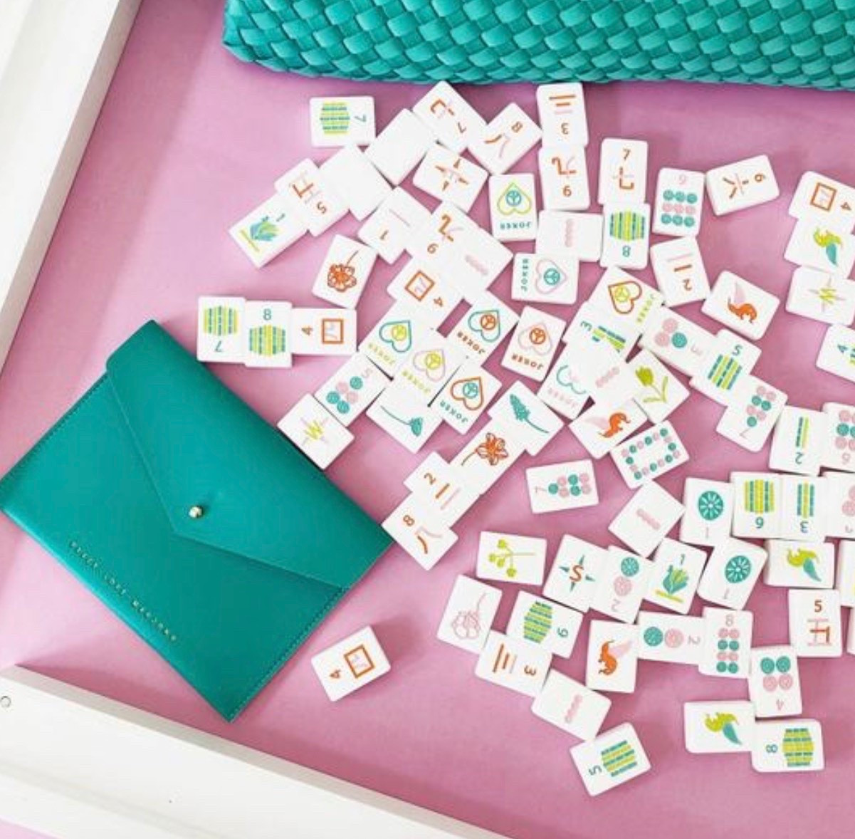 Little Mahj - Kids Mahjong Sets

Each set comes in a Little Mahj Custom Box & includes:
• 160 kid-sized teal mahjong tiles (1" x 0.75" x 0.24")
• 4 chartreuse wooden racks (12.5" long)
• Light pink rack bag with 4 individual compartments
• 20" x 20" pink mat for a smooth playing surface
• Quilted puffer crossbody bag (chartreuse) that holds the entire set - super cute, lightweight, and easy to carry (15"x 9"x 3")
• Quilted puffer tile bag (chartreuse) to keep your tiles safe & snug (10"x6")
• 4 Little Mahj Playing Cards made just for kids to simplify the NMJL card and make playing and learning stress-free and fun!

#LTKdayinmylife #LTKmomlife #LTKKids