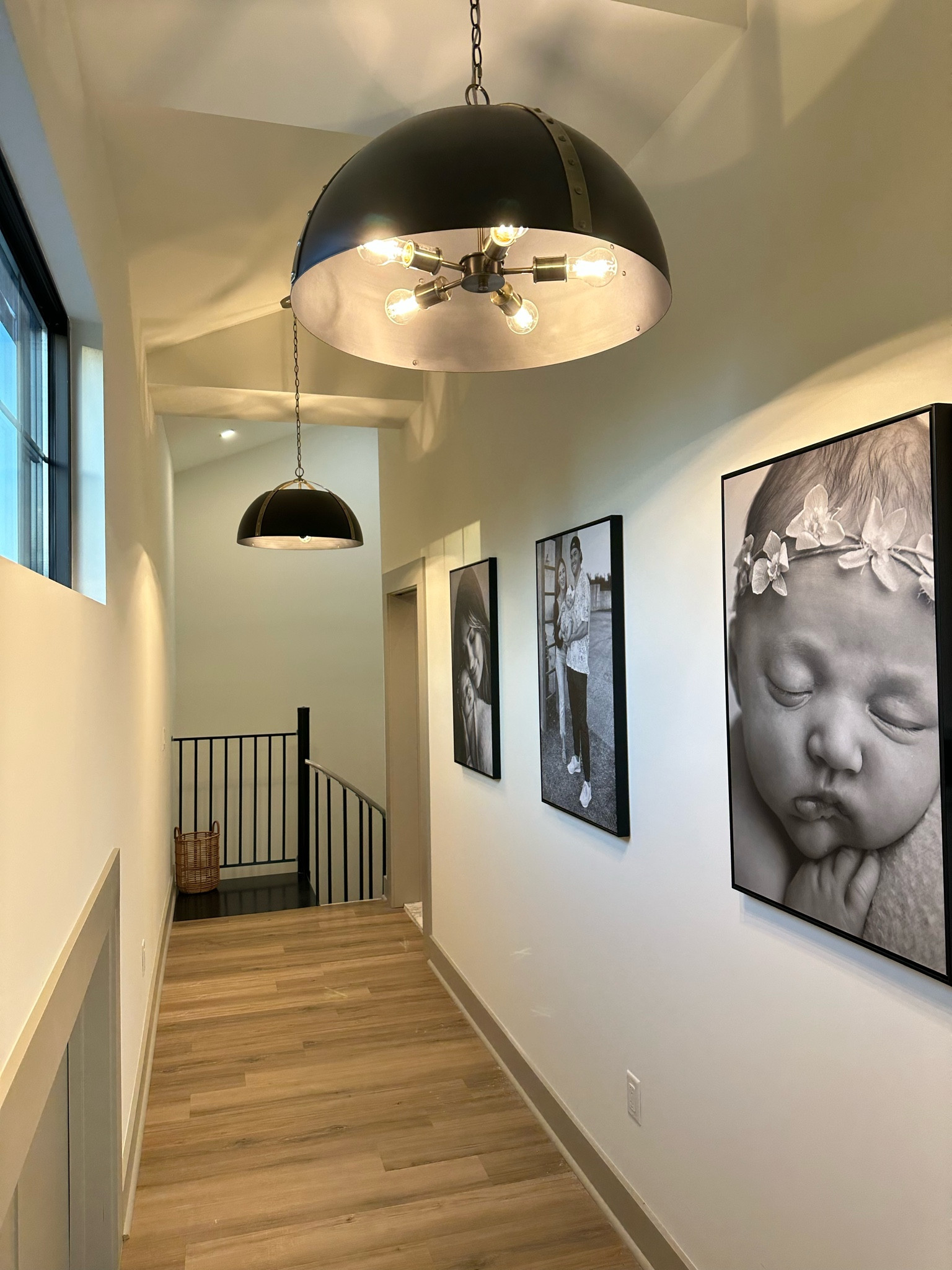 Framed canvas printed wall photos and Barndominium chandelier farmhouse lights 

#LTKunder100 #LTKhome #LTKFind