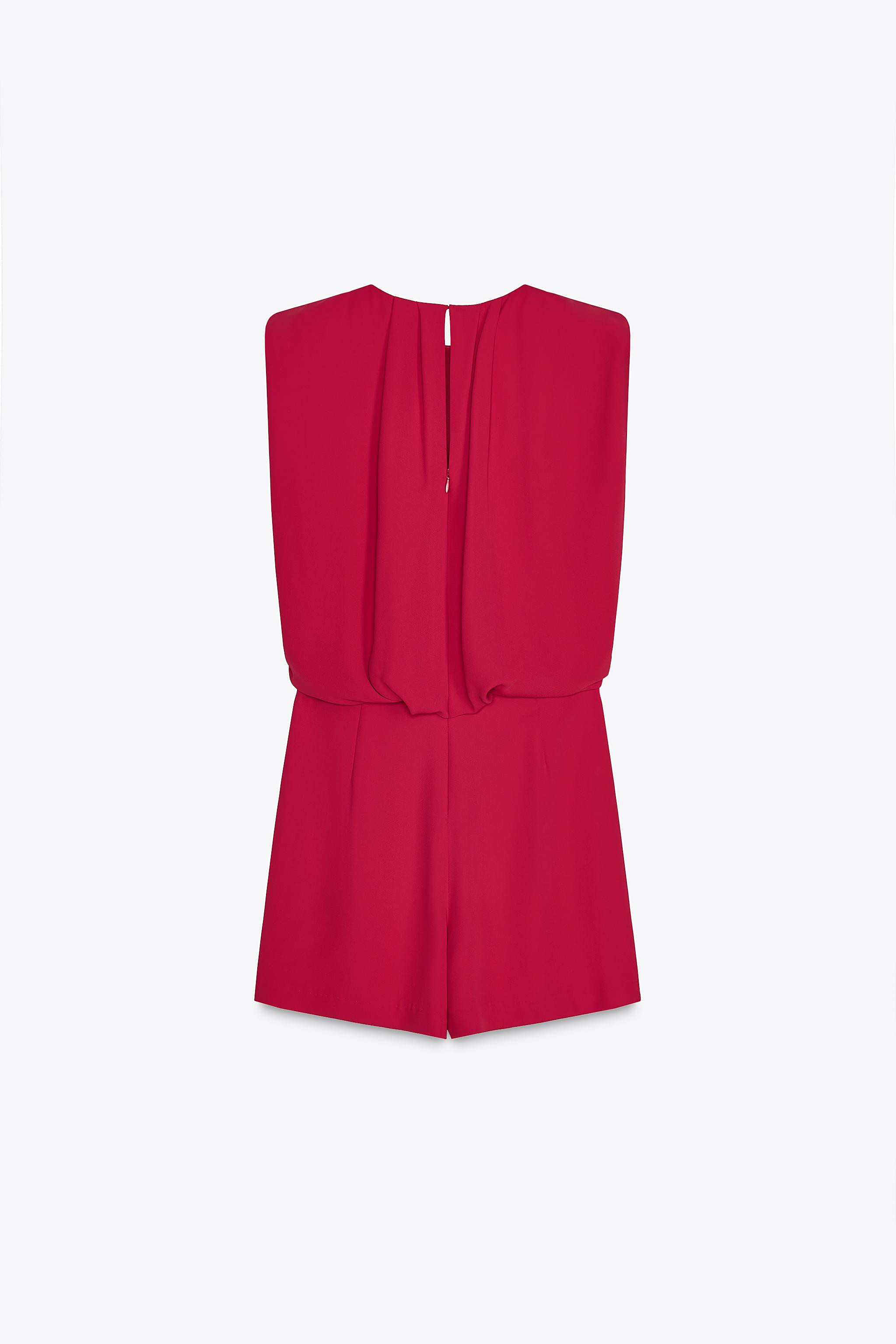 Sleeveless round neck jumpsuit with pleats. Wrap front. Back concealed zipper closure with slit a... | Zara US