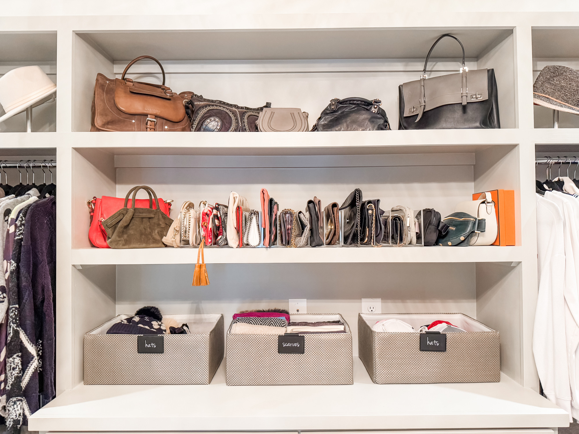 Organization challenge: Clutch edition
Difficulty level: Piece of cake! 🍰

Our goal is always to make everything as accessible as possible and clutches and handbags are one of those things that can be out of sight, out of mind. Popping these acrylic dividers into this closet makes the clutches front and center and easy to grab so they actually get used! 

 