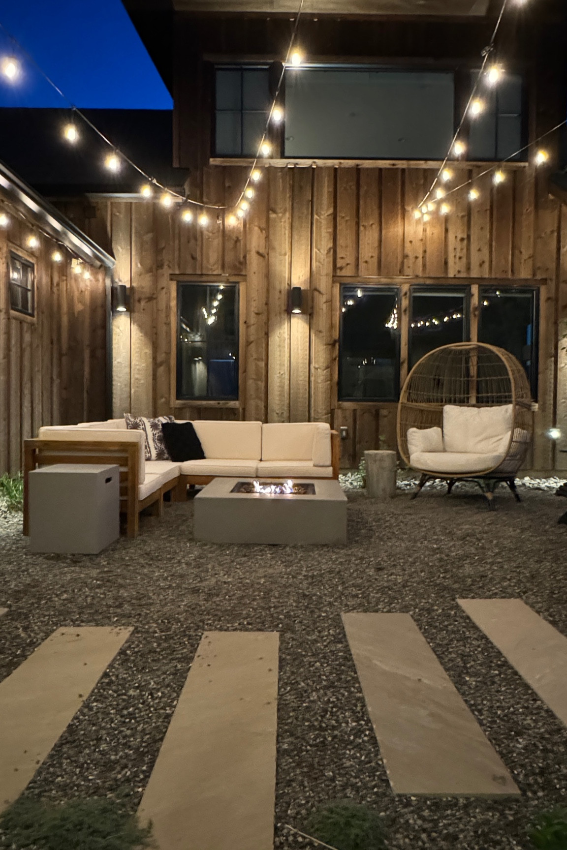 Our courtyard at night! This patio sectional set is the best — and it comes with the firepit!! Also loooove this cozy egg chair 🤍 this space is just dreamy for me.

Patio set, egg chair, firepit, cozy outdoor couch, outdoor sectional, modular, outdoor patio set, comfy outdoor seatingg

#LTKHome