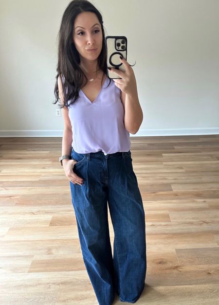 I have been for sure trying out new styles this fall! 
Like these wide leg jeans. These jeans actually make my behind look cute - which is what stopped me from buying wide jeans before! 
I am totally sold on this style!
The lavender top is the color of the fall 2023 and it is on sale! 

#LTKstyletip #LTKfindsunder50 #LTKSeasonal
