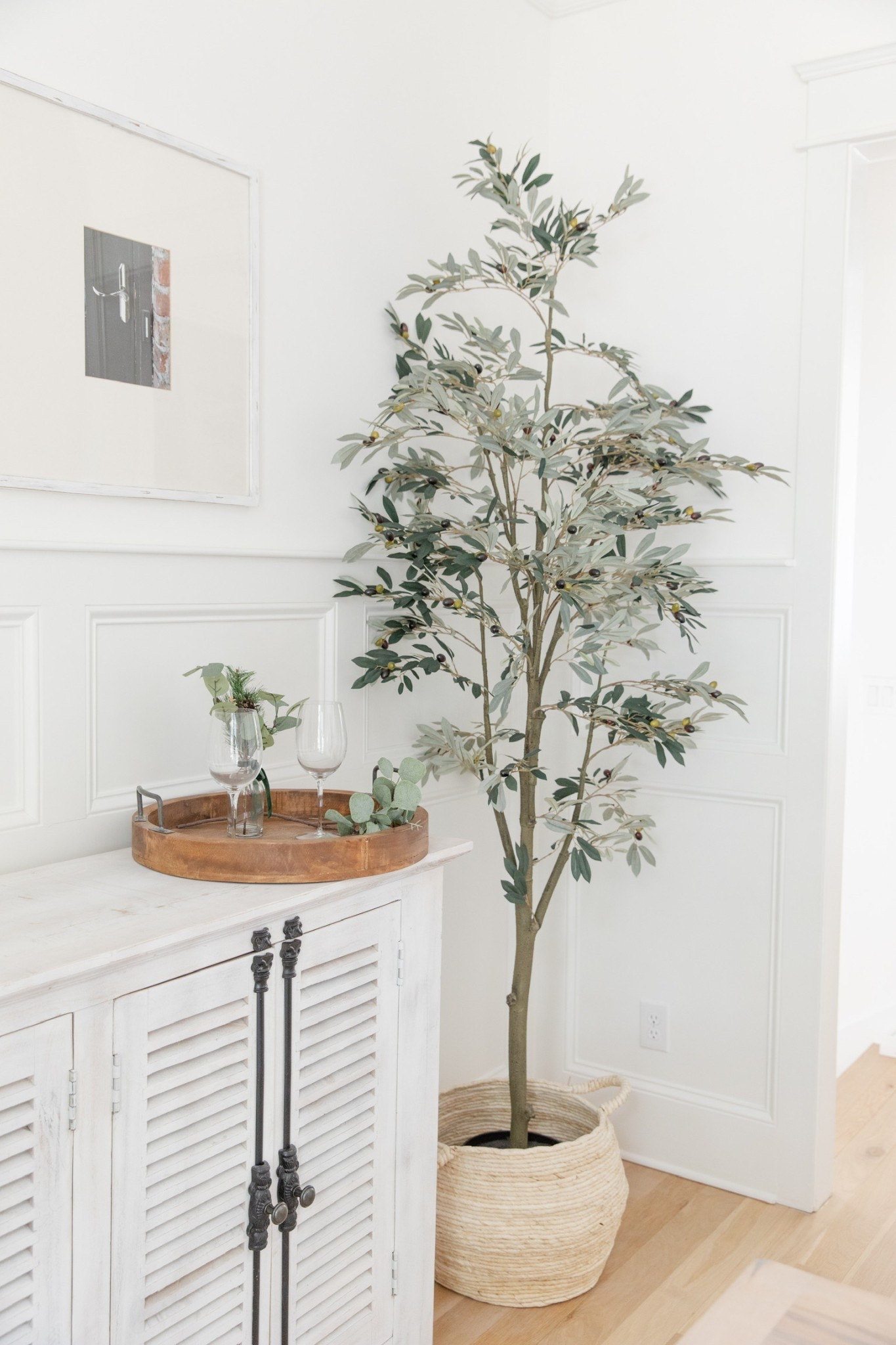 Our potted olive tree in the corner of our dining room. Such a statement piece!

#LTKHome #LTKSeasonal