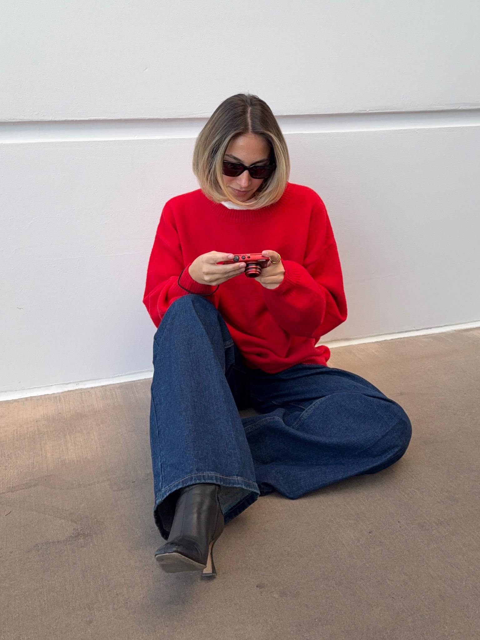 Winter outfit, winter style, red sweater, red jumper, red cardigan, dark wash denim, dark wash jeans, wide leg jeans, dark wash wide leg denim, black boots, black heeled boots

#LTKShoeCrush #LTKSeasonal #LTKStyleTip