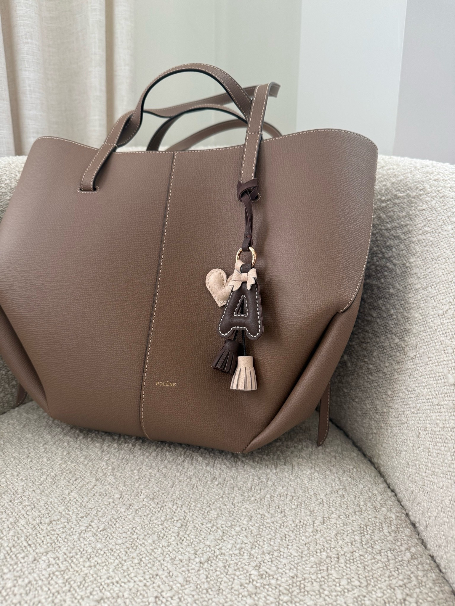 This custom bag charm looks like it would cost $100. Wrong. It is so affordable and looks so luxe. Perfect holiday gift.

#LTKSeasonal #LTKstorytime #LTKgrwm